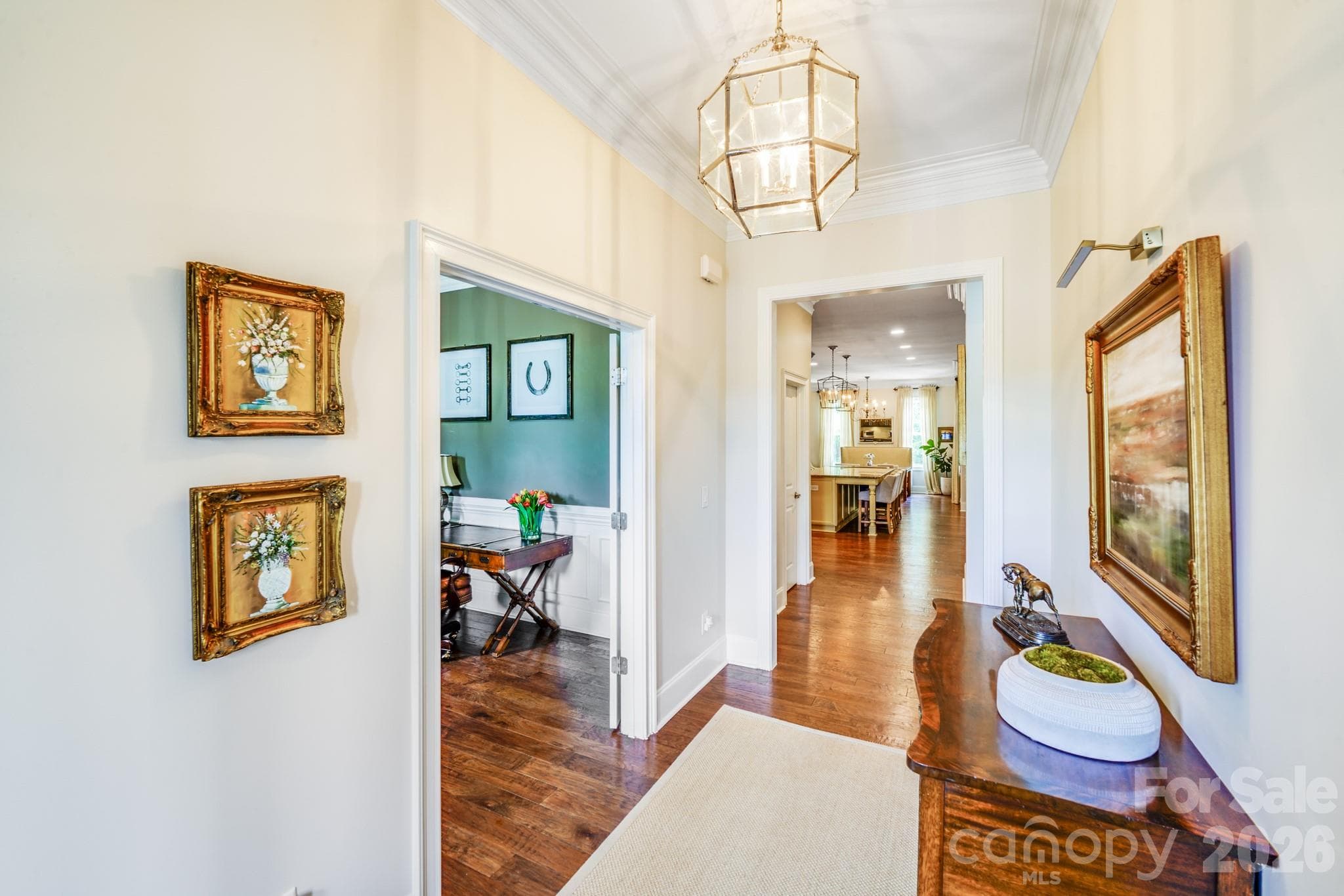 This elegant home features a wide foyer with crown molding and tall ceilings that create a sense of grandeur - 2702 Arsdale Road, Waxhaw