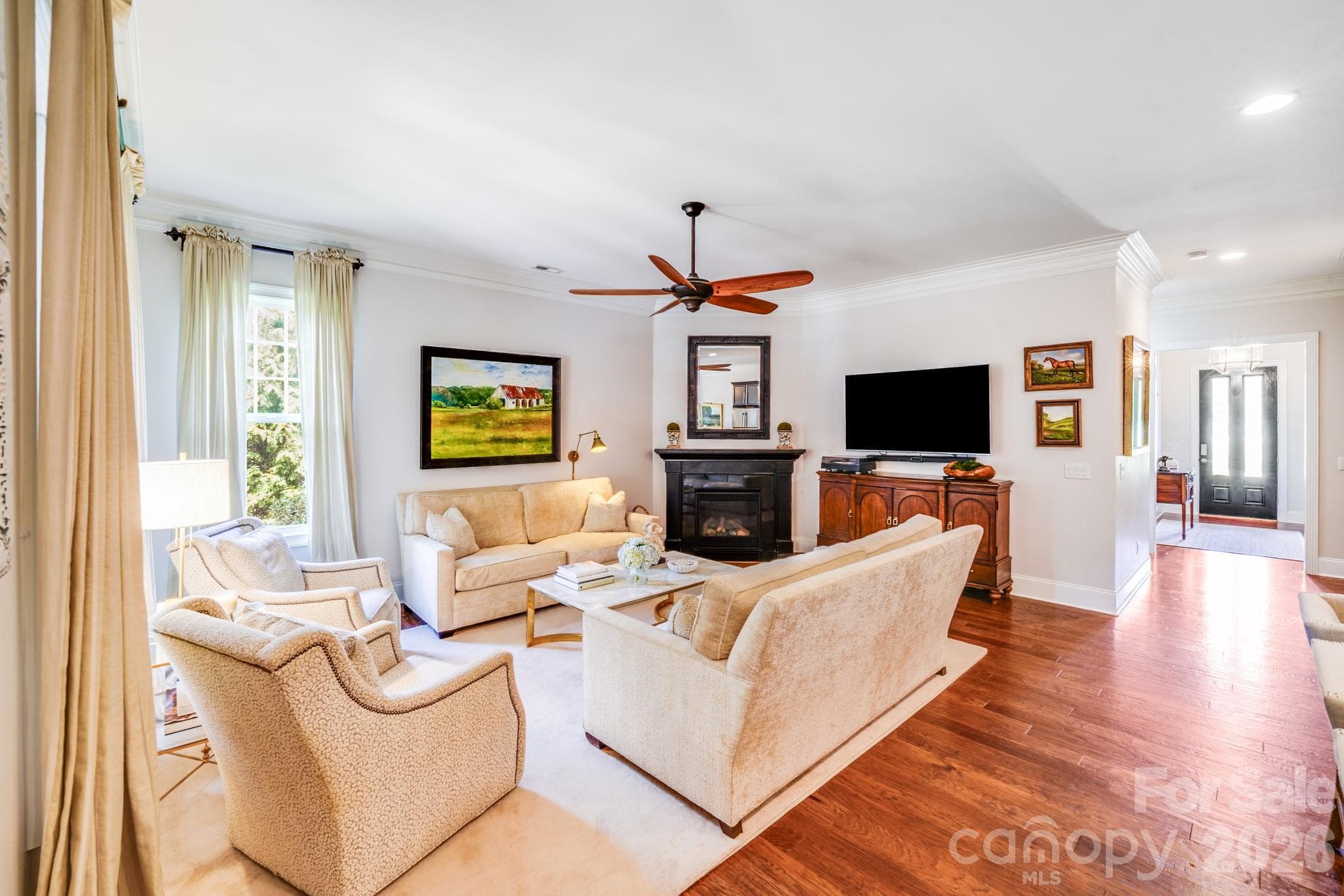 Spacious layout that flows seamlessly into the adjacent kitchen and dining areas, ideal for modern open-concept living - 2702 Arsdale Road, Waxhaw