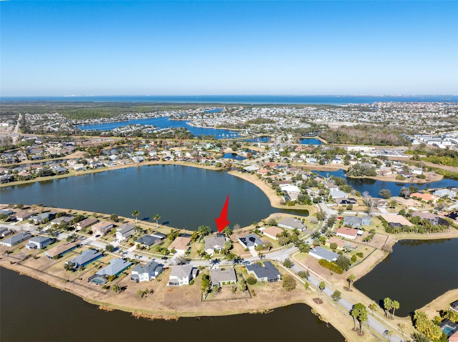 Home location set on large pond - 5431 SANDY SHELL DR, APOLLO BEACH