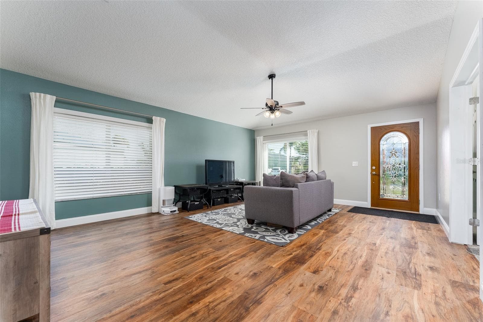 Living room 16x21, with luxury plank vinyl flooring - 5431 SANDY SHELL DR, APOLLO BEACH