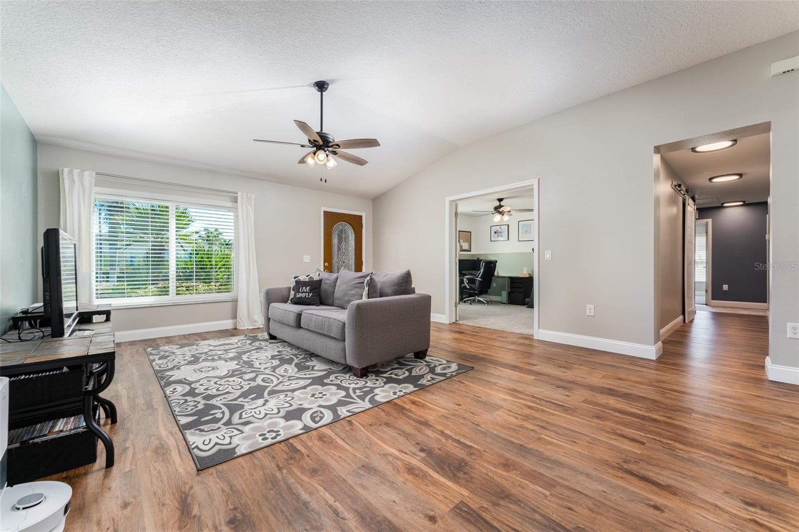 Living room view from dining area - 5431 SANDY SHELL DR, APOLLO BEACH