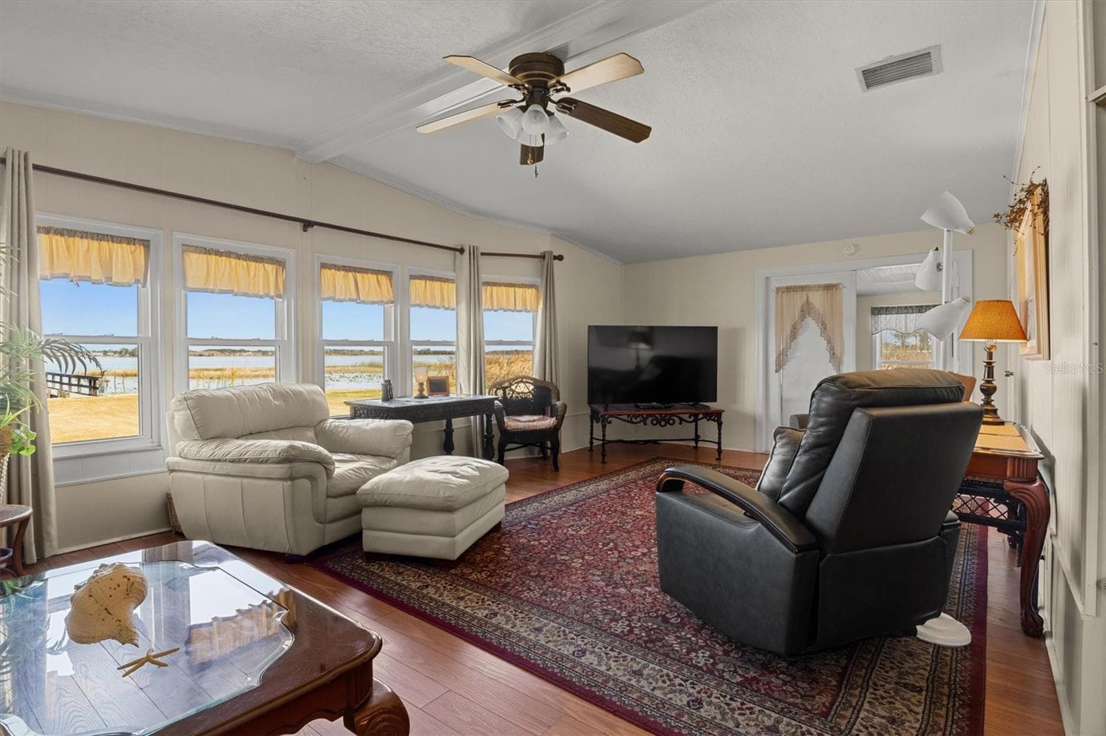 Living Room - Panoramic Views of Lake Henry - 6825 S LAKE HENRY DR NE, WINTER HAVEN