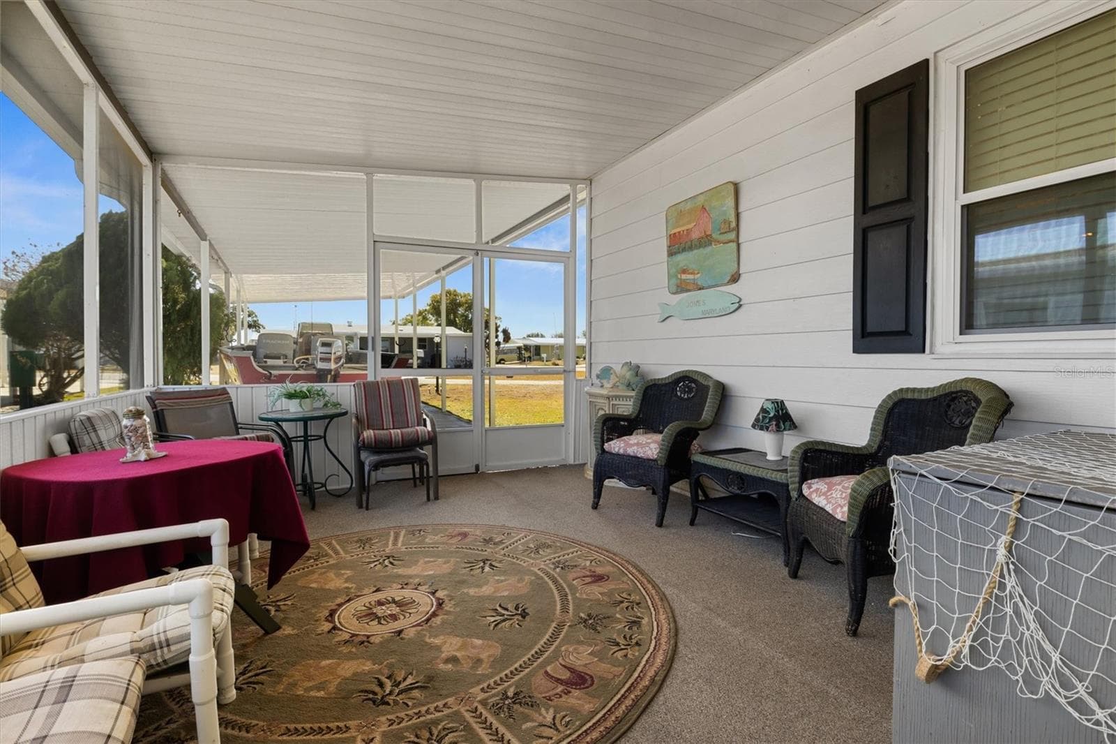 Screen Enclosed Porch - 6825 S LAKE HENRY DR NE, WINTER HAVEN
