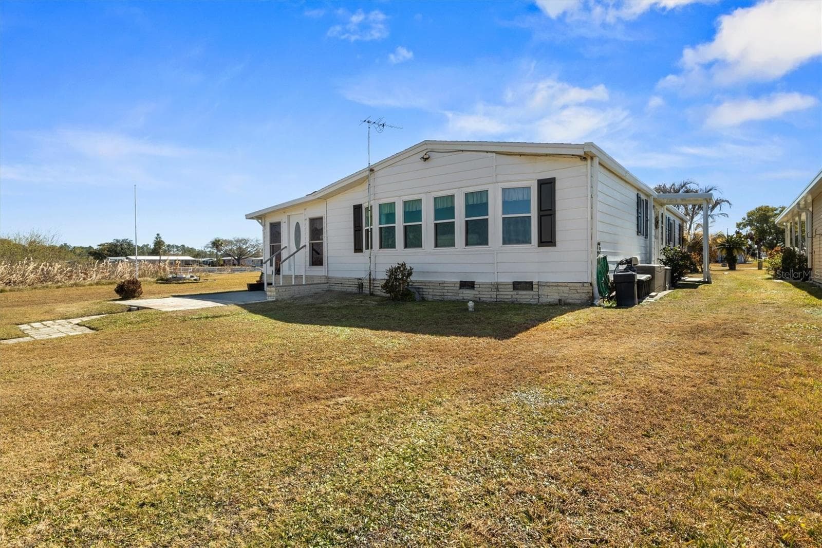 Back Exterior - 6825 S LAKE HENRY DR NE, WINTER HAVEN