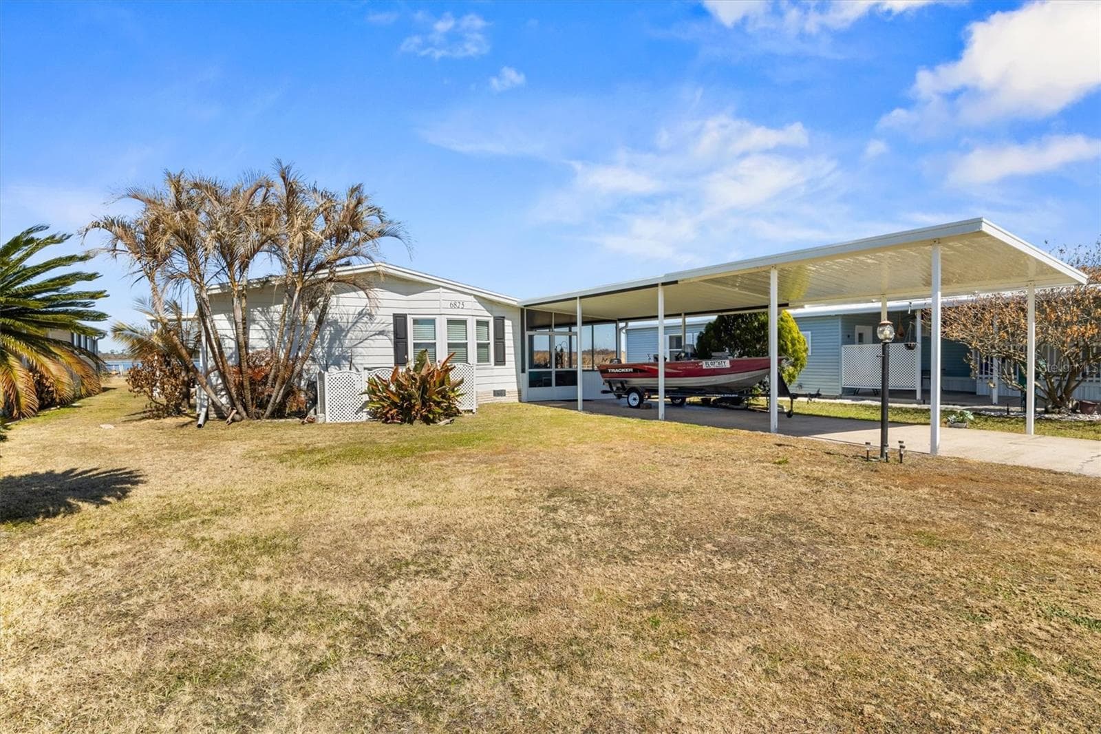 Front yard - 6825 S LAKE HENRY DR NE, WINTER HAVEN