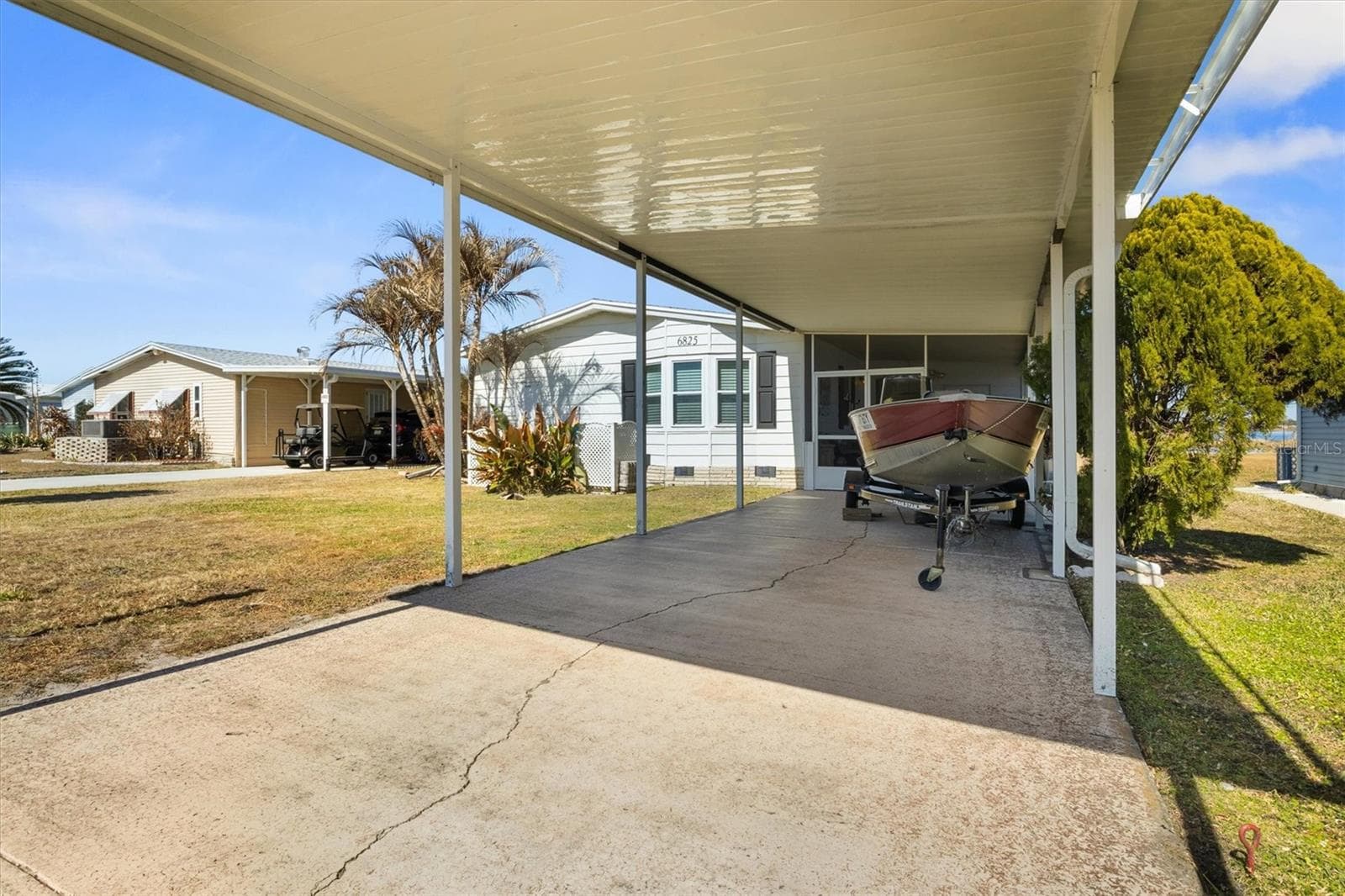 Covered parking - 6825 S LAKE HENRY DR NE, WINTER HAVEN