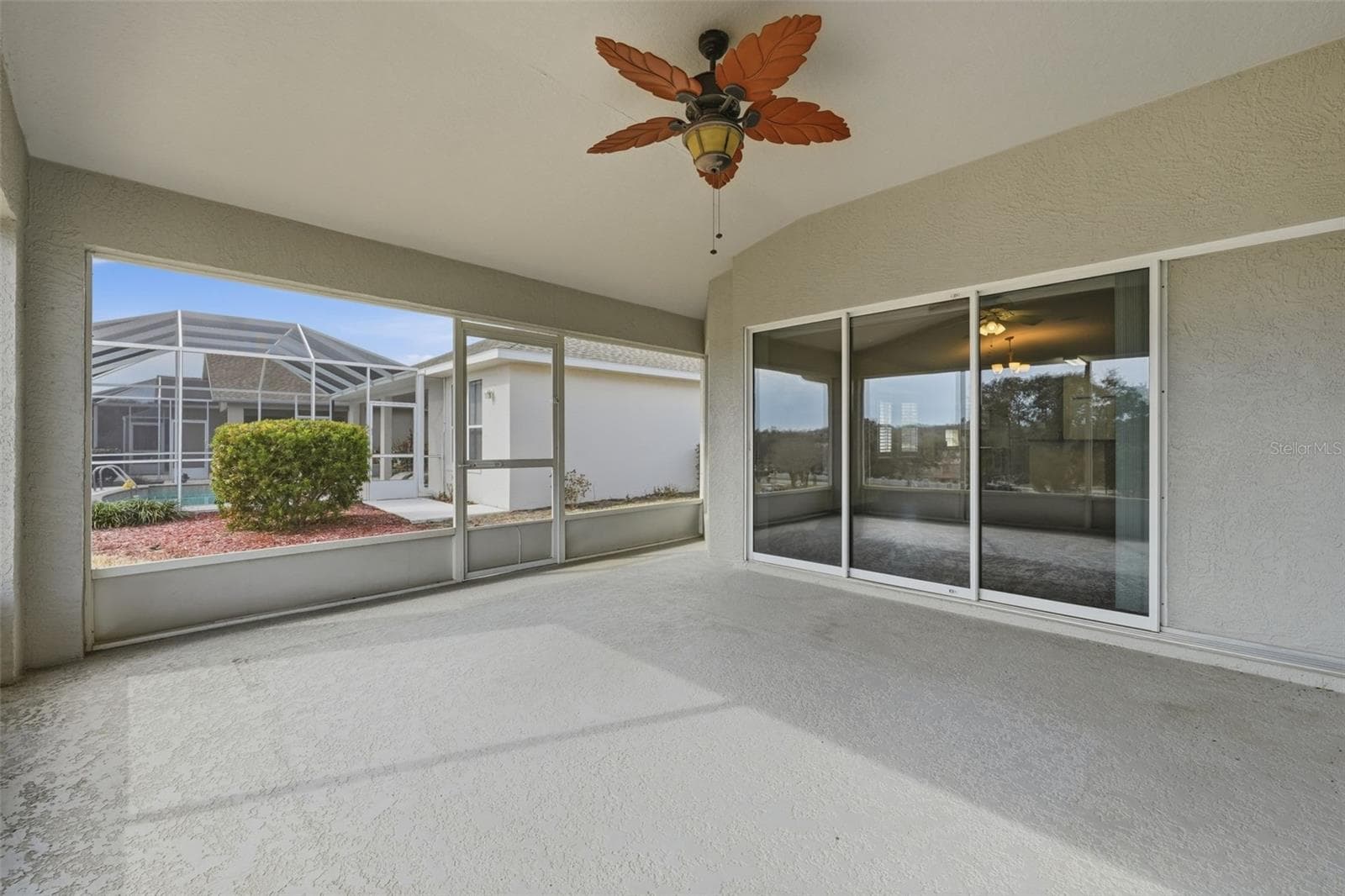 Lanai with triple pocket sliders to great room and living space! - 2311 N ANDREA PT, LECANTO