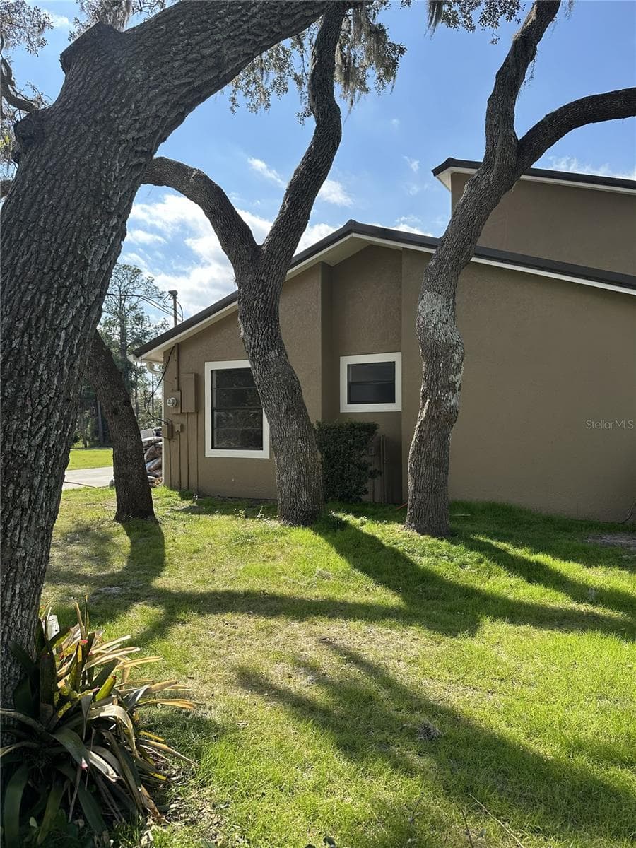 RIGHT SIDE OF HOME - 2598 ENTERPRISE OSTEEN RD, OSTEEN