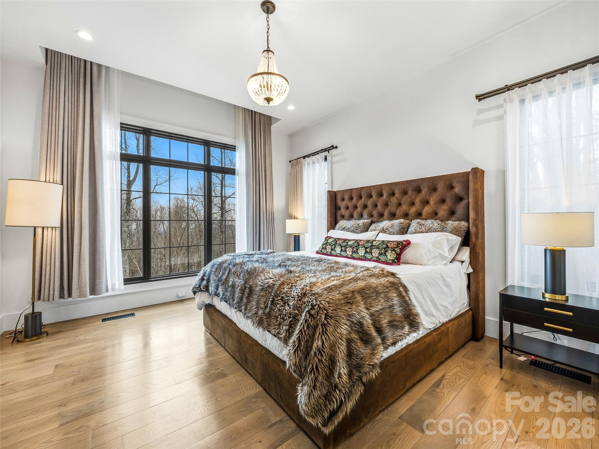 Light-filled primary suite with large windows and elegant finishes - 241 Tower Circle, Hendersonville