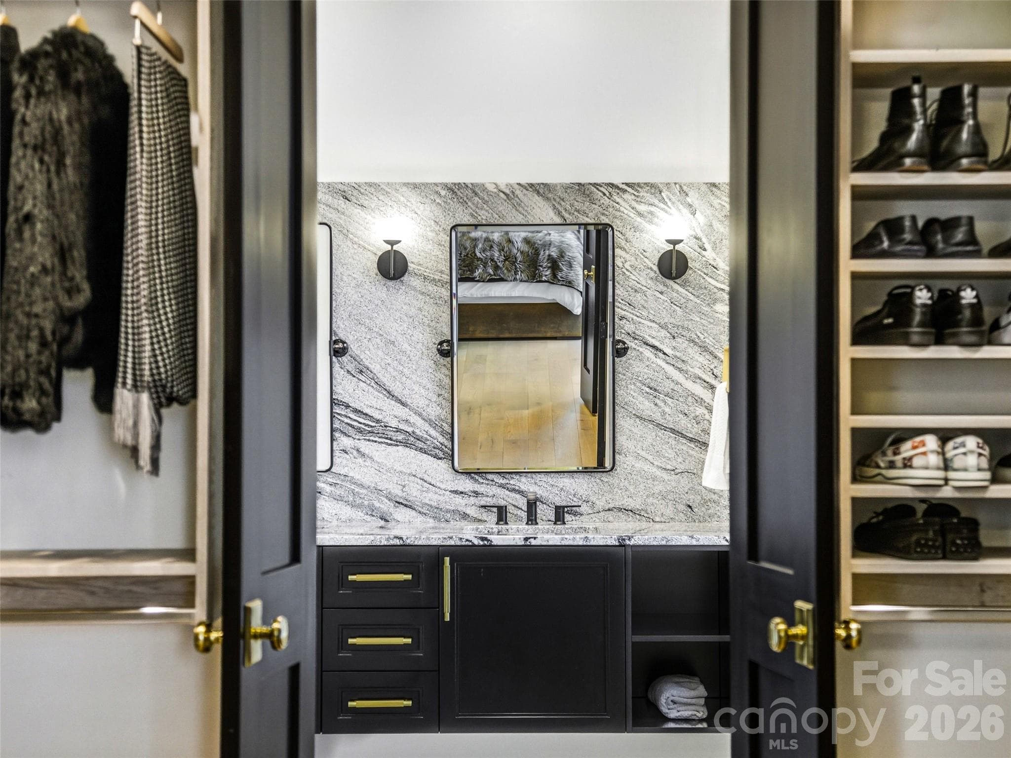Primary bath vanity with dual sinks, custom cabinetry, and designer fixtures - 241 Tower Circle, Hendersonville