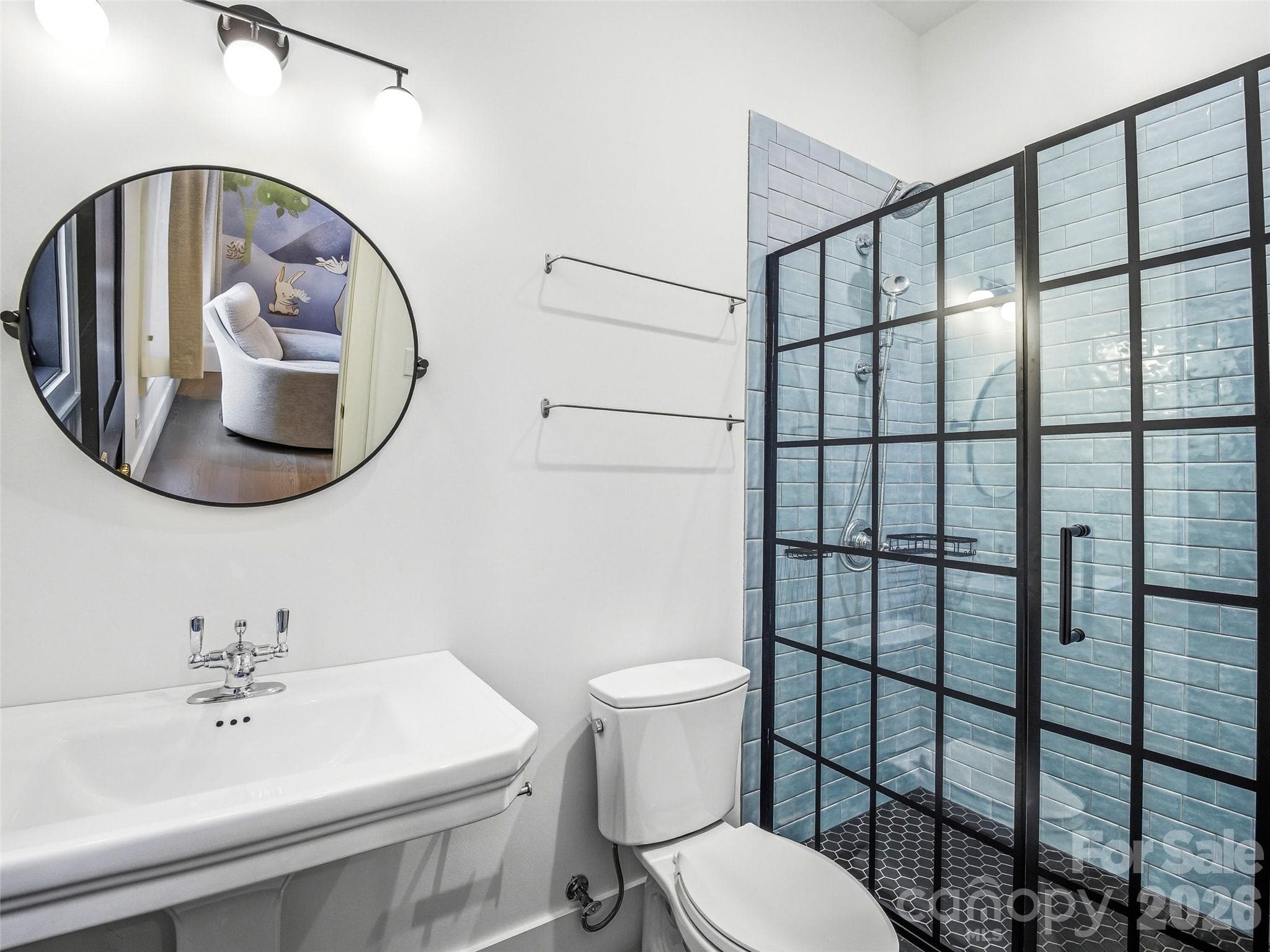 Lower-level full bath with tiled shower and contemporary fixtures (representative of lower-level baths) - 241 Tower Circle, Hendersonville