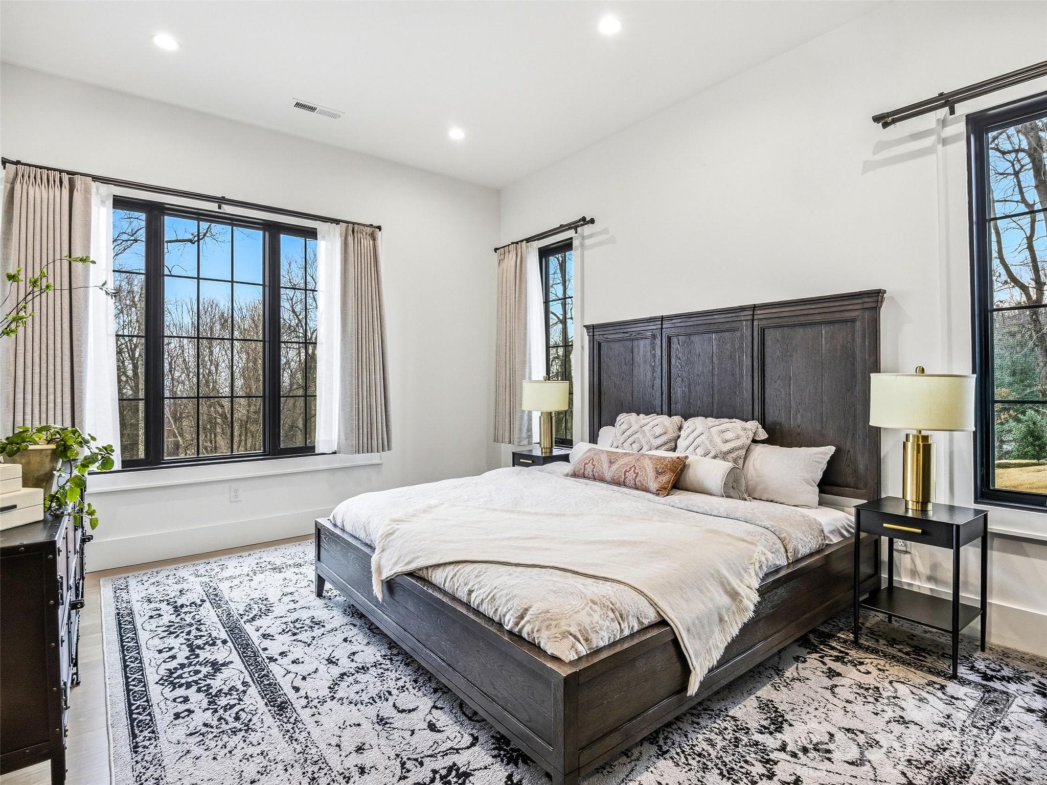 Comfortable guest bedroom (could be a 2nd primary) with large windows and neutral finishes - 241 Tower Circle, Hendersonville