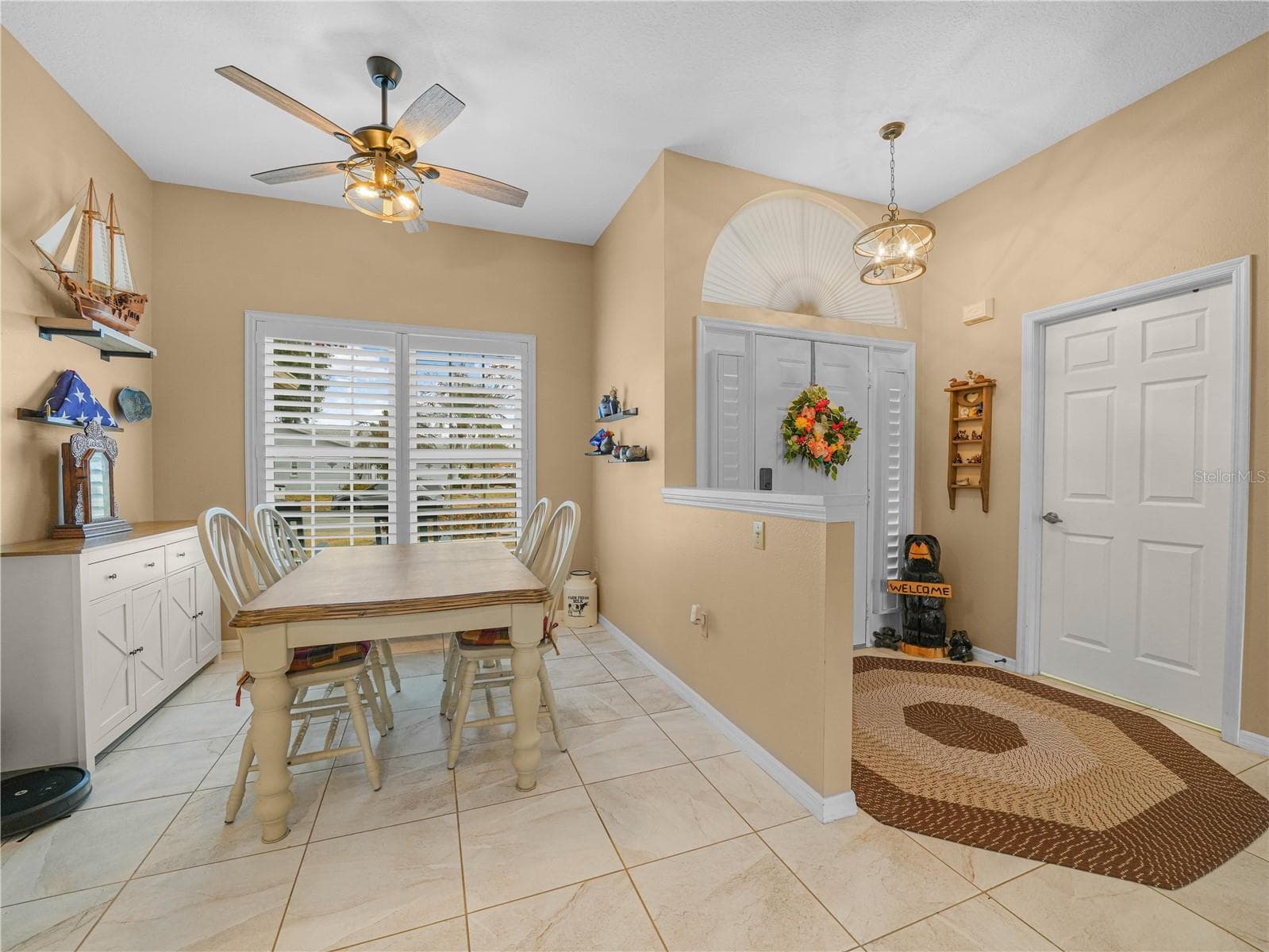 Wide Foyer opens to Dining and Living Room - 5888 SANDPIPERS DR, LAKELAND