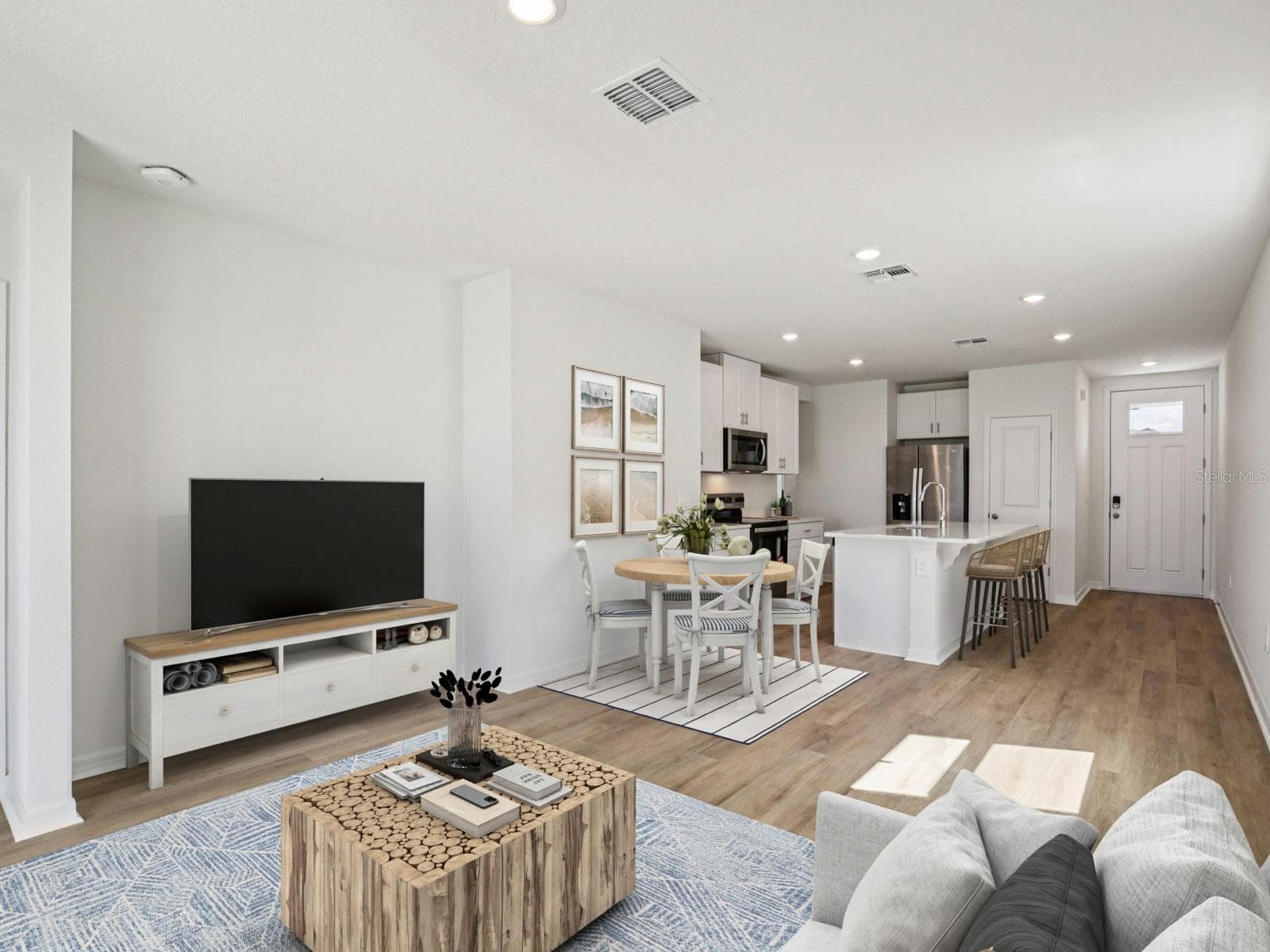 Interior photos are not of the actual home but are photos of the builder home with same floorplan with similar interior finishes and features. Photo uses virtual staging. - 161 CANOE BEND AVE, NOKOMIS