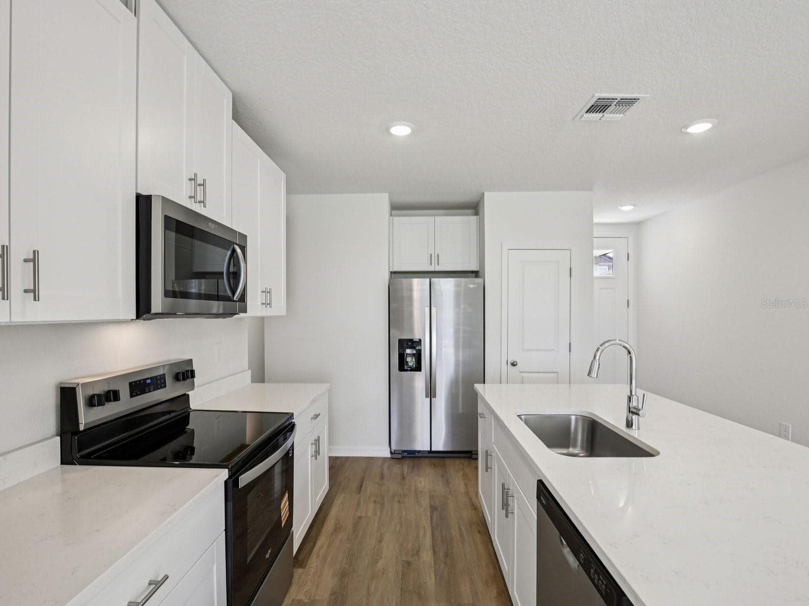 Interior photos are not of the actual home but are photos of the builder home with the same floorplan with similar interior finishes and features. - 161 CANOE BEND AVE, NOKOMIS