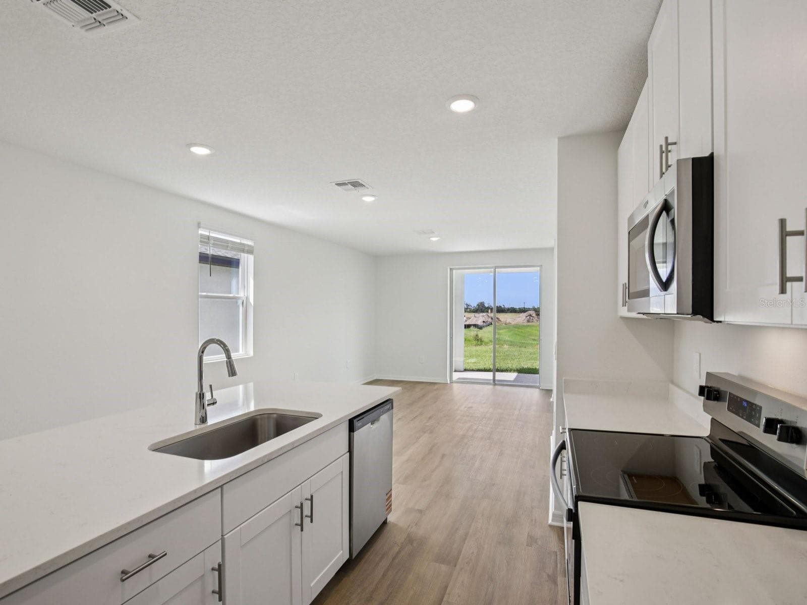 Interior photos are not of the actual home but are photos of the builder home with the same floorplan with similar interior finishes and features. - 161 CANOE BEND AVE, NOKOMIS