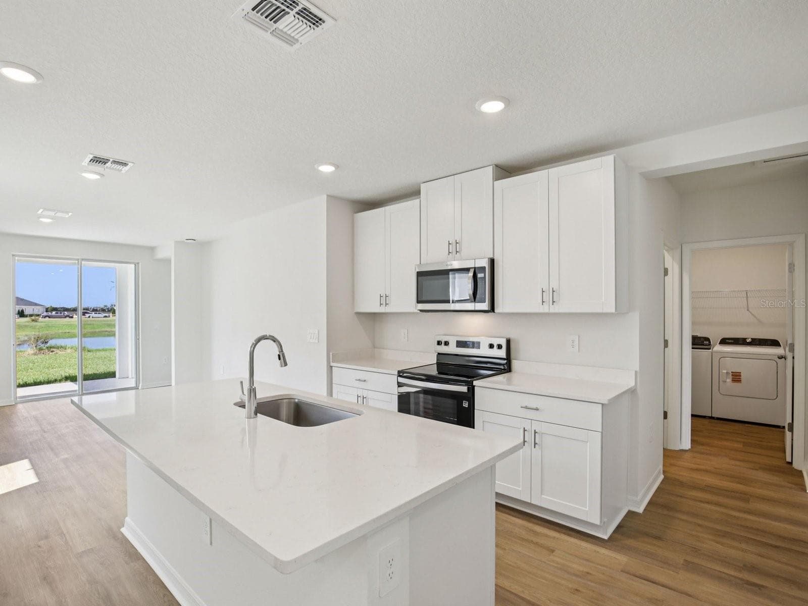 Interior photos are not of the actual home but are photos of the builder home with the same floorplan with similar interior finishes and features. - 161 CANOE BEND AVE, NOKOMIS