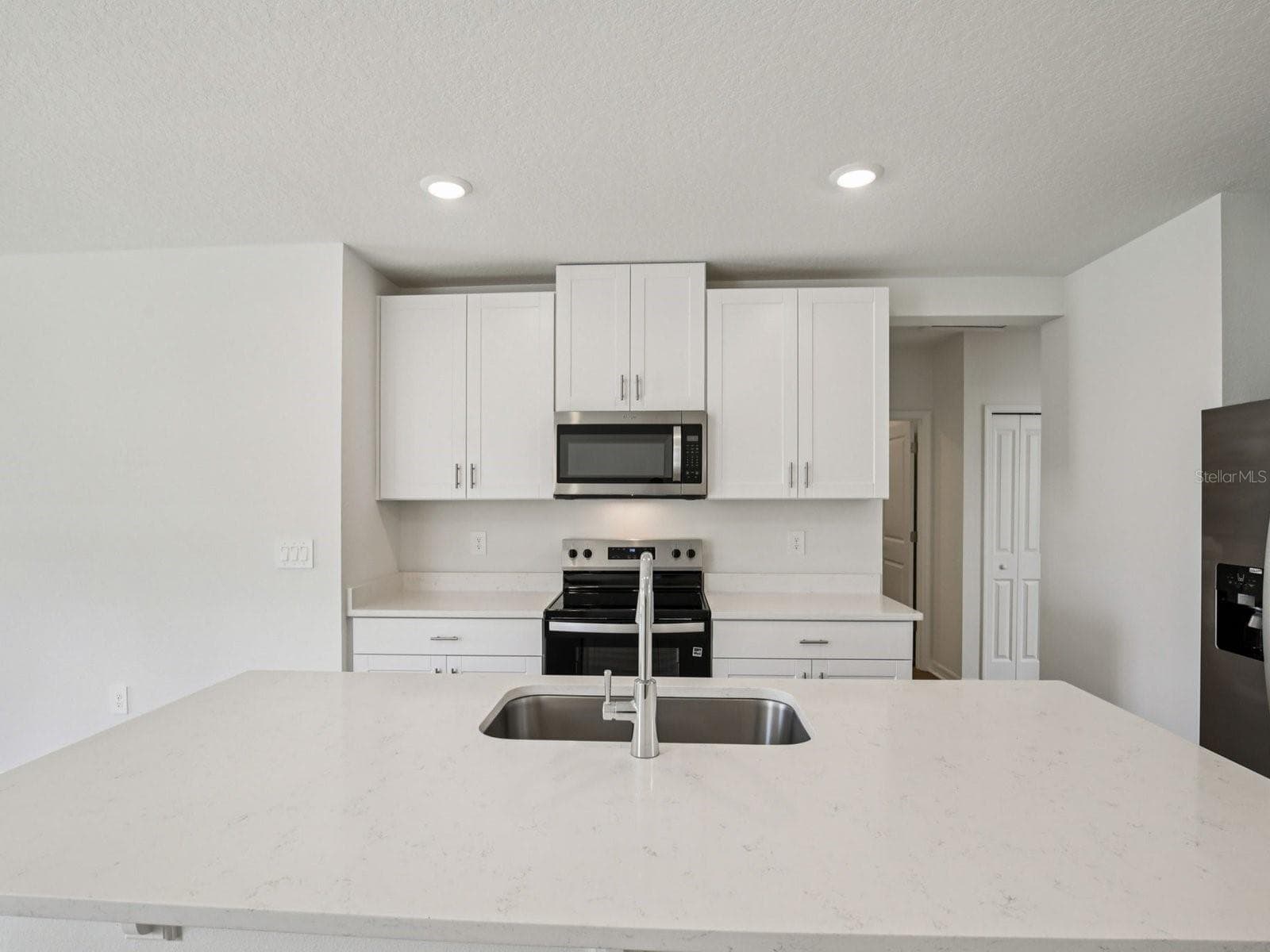 Interior photos are not of the actual home but are photos of the builder home with the same floorplan with similar interior finishes and features. - 161 CANOE BEND AVE, NOKOMIS