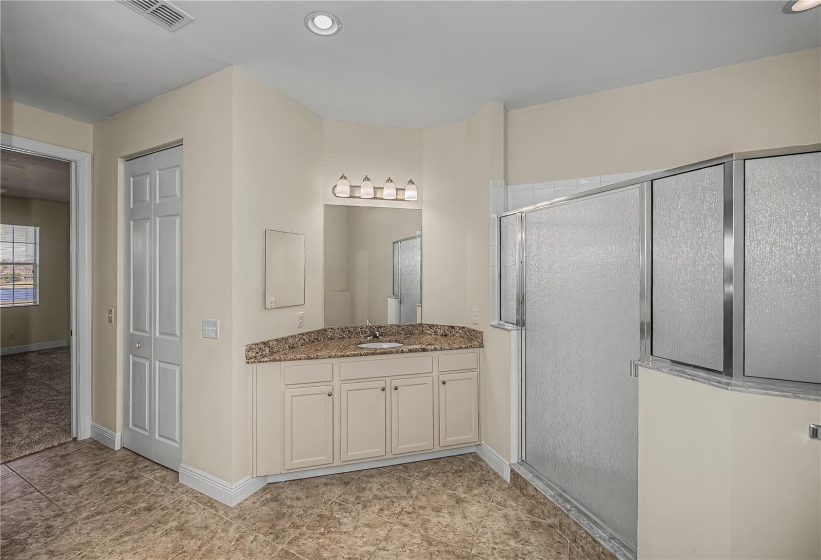 primary ensuite bathroom - 25601 HERITAGE LAKE BLVD #46, PUNTA GORDA