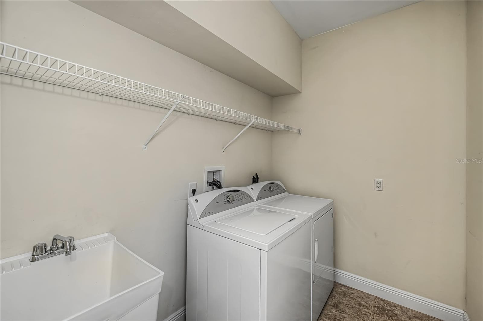 spacious laundry room - 25601 HERITAGE LAKE BLVD #46, PUNTA GORDA