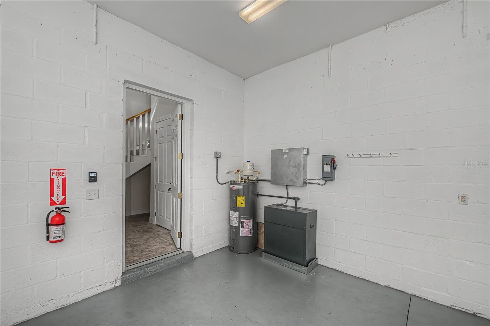 pull into your private attached garage - 25601 HERITAGE LAKE BLVD #46, PUNTA GORDA