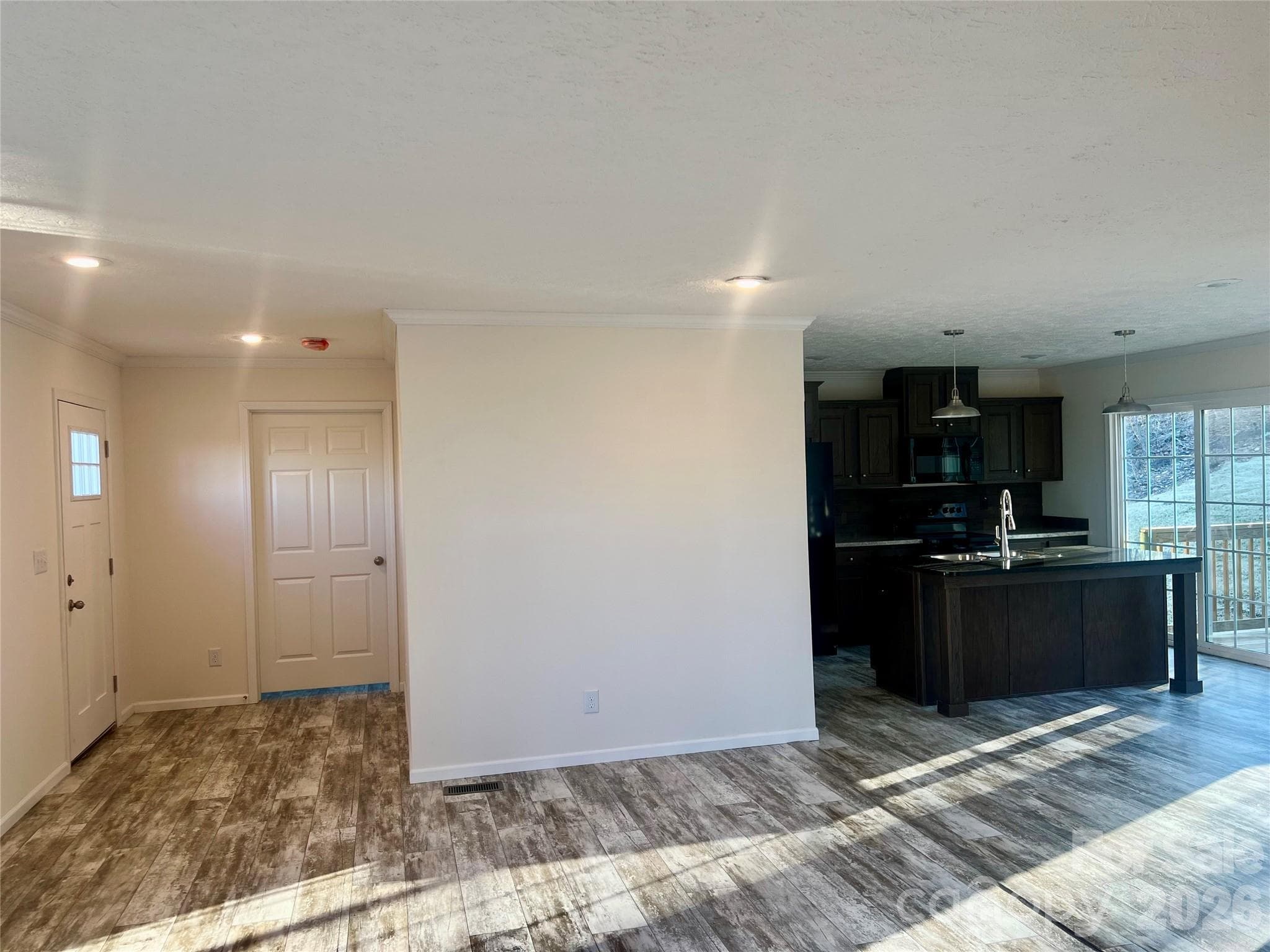 Great Room to Kitchen - 5748 Dalmatian Street, Iron Station