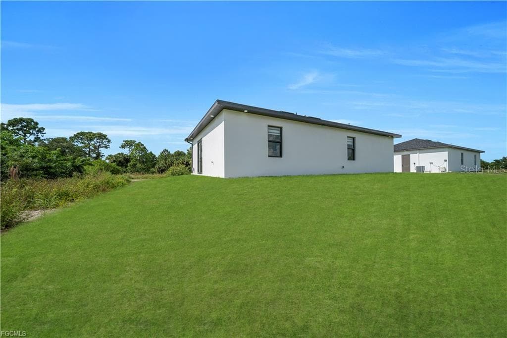 Single Family Residence at 711 ROMA AVE S, LEHIGH ACRES, photo 26 of 38
