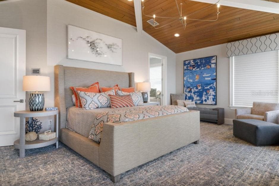 Upper level primary bedroom with private balcony - 110 10TH ST S, BRADENTON BEACH