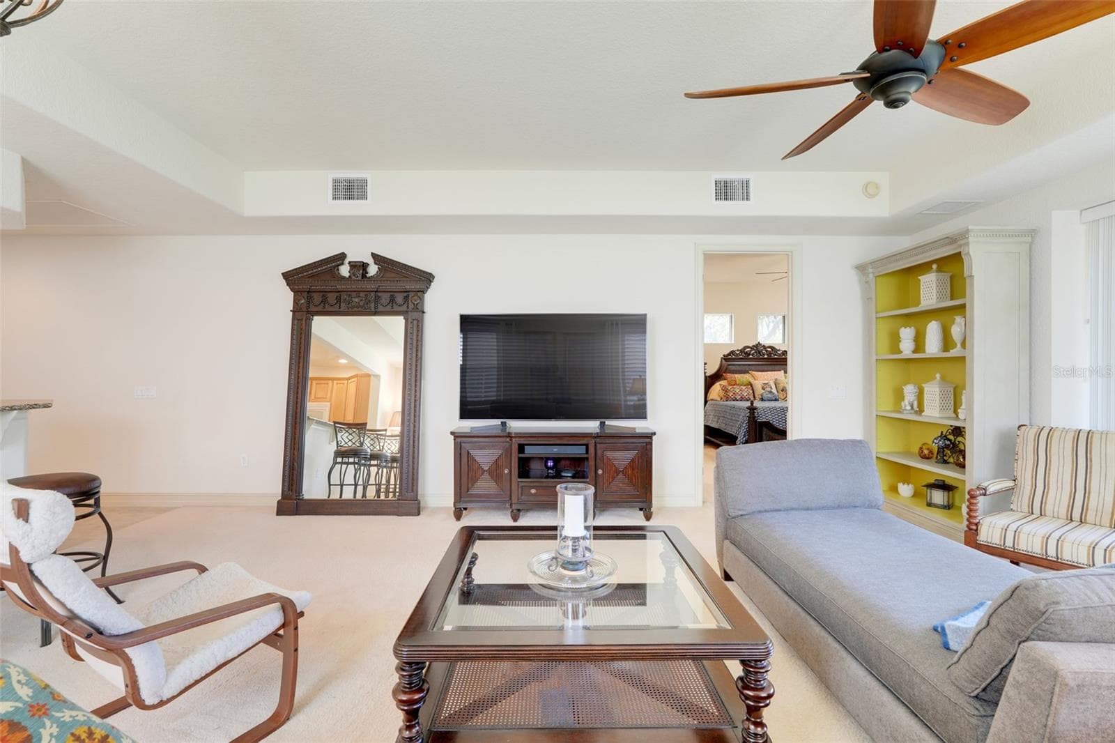 Living room connects to primary room. - 26206 AVENIDA LAS COLINAS #4A, HOWEY IN THE HILLS
