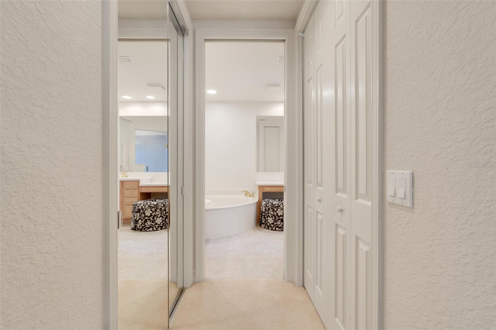 Master Walk-in Closet on one side and regular closet on the other side - 26206 AVENIDA LAS COLINAS #4A, HOWEY IN THE HILLS