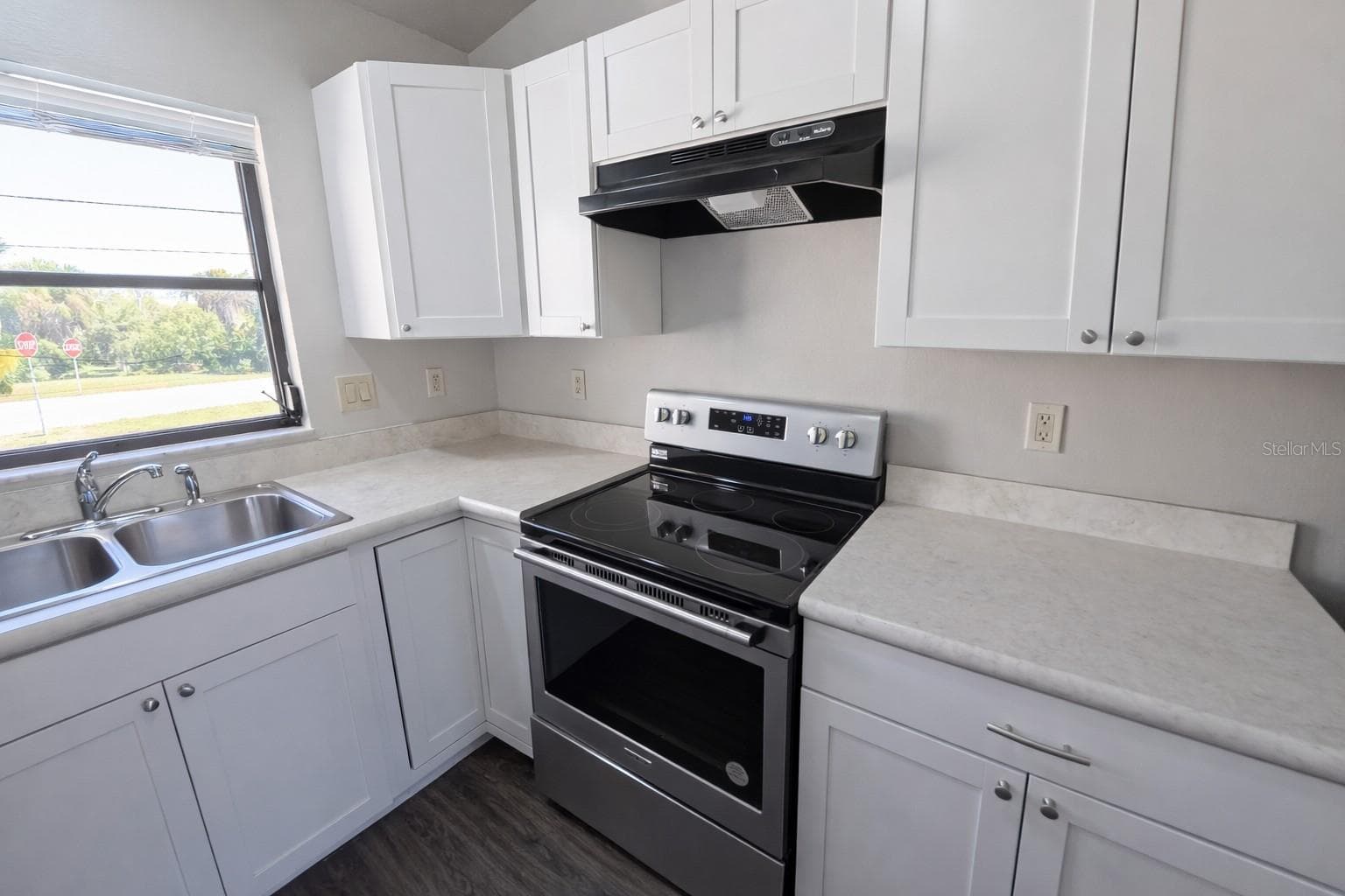 Unit A kitchen - 3211 RIVERSIDE DR, PUNTA GORDA