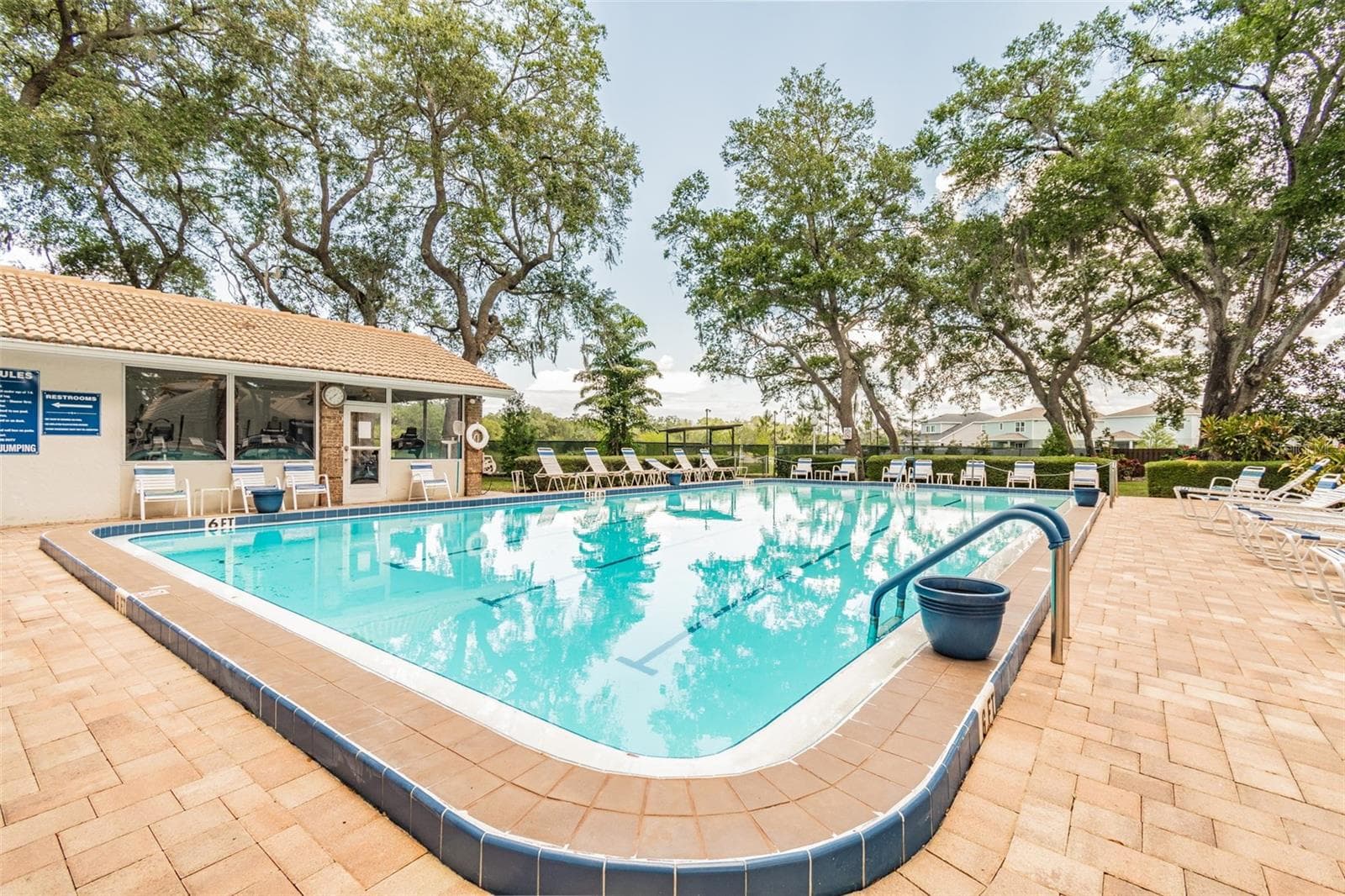 Fitness center and heated pool. - 5611 GARDEN LAKES DR, BRADENTON