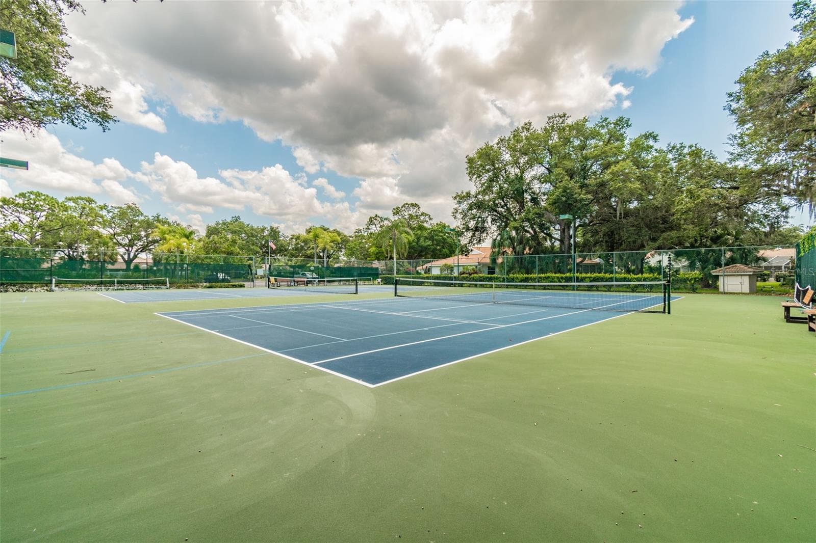Tennis and pickleball courts. - 5611 GARDEN LAKES DR, BRADENTON