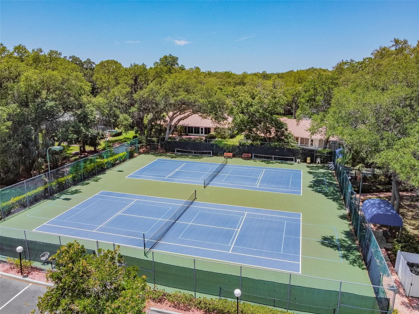 Another view of the tennis and pickleball courts. - 5611 GARDEN LAKES DR, BRADENTON