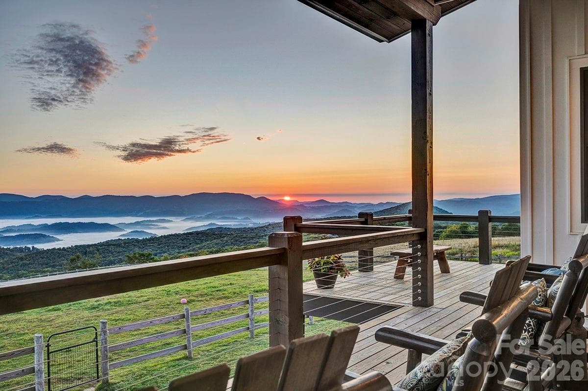 Indoor/outdoor living with multiple porches overlooking the mountains and pastures - 217 Sunrise Vista Lane, Banner Elk