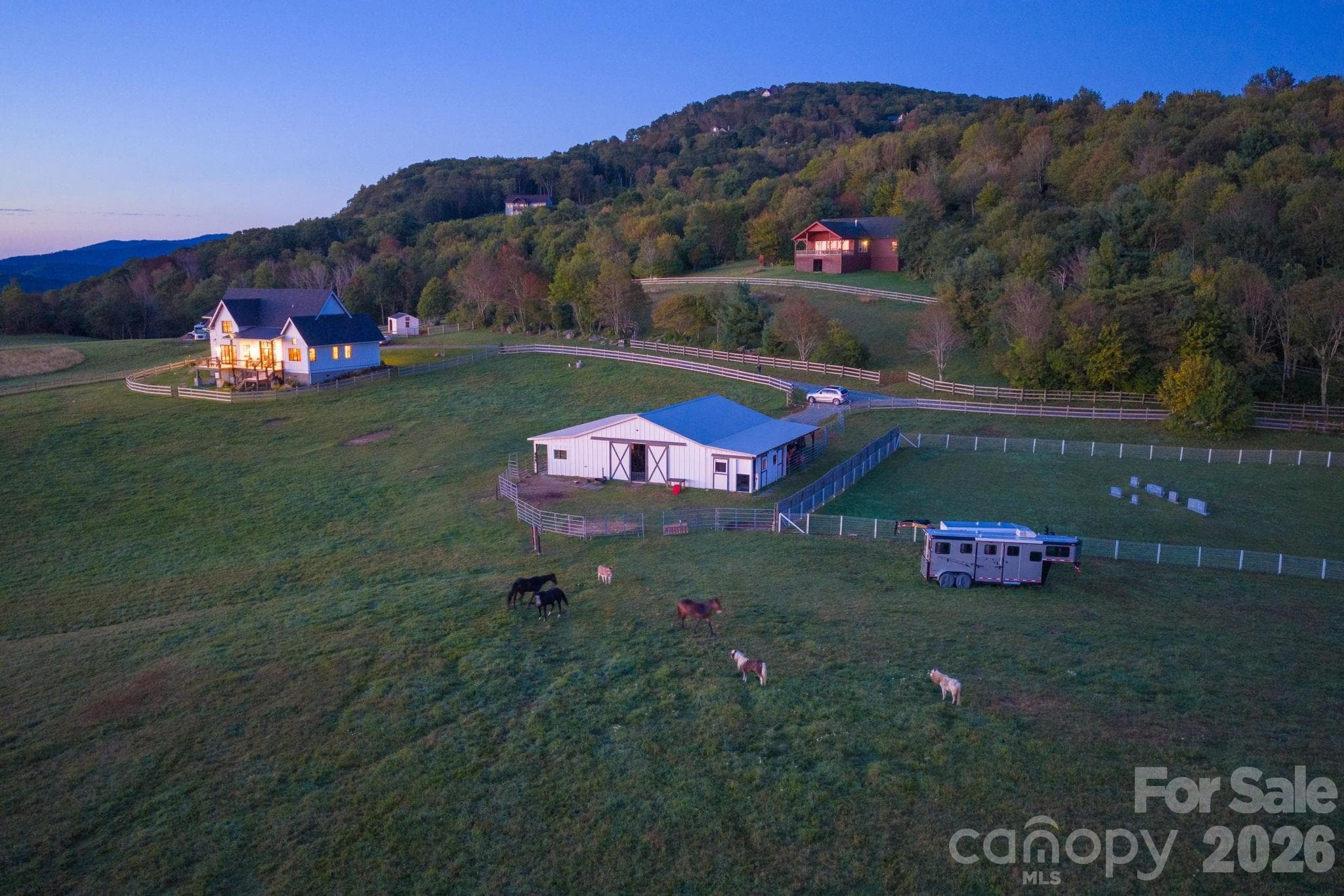 7 stall hard-board barn and board fenced pastures - 217 Sunrise Vista Lane, Banner Elk