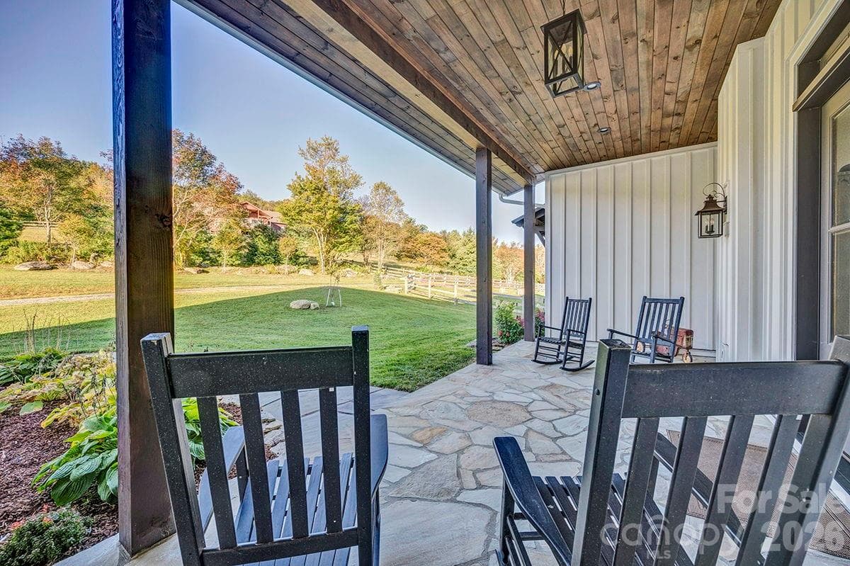 Welcoming front porch with flagstone flooring - 217 Sunrise Vista Lane, Banner Elk