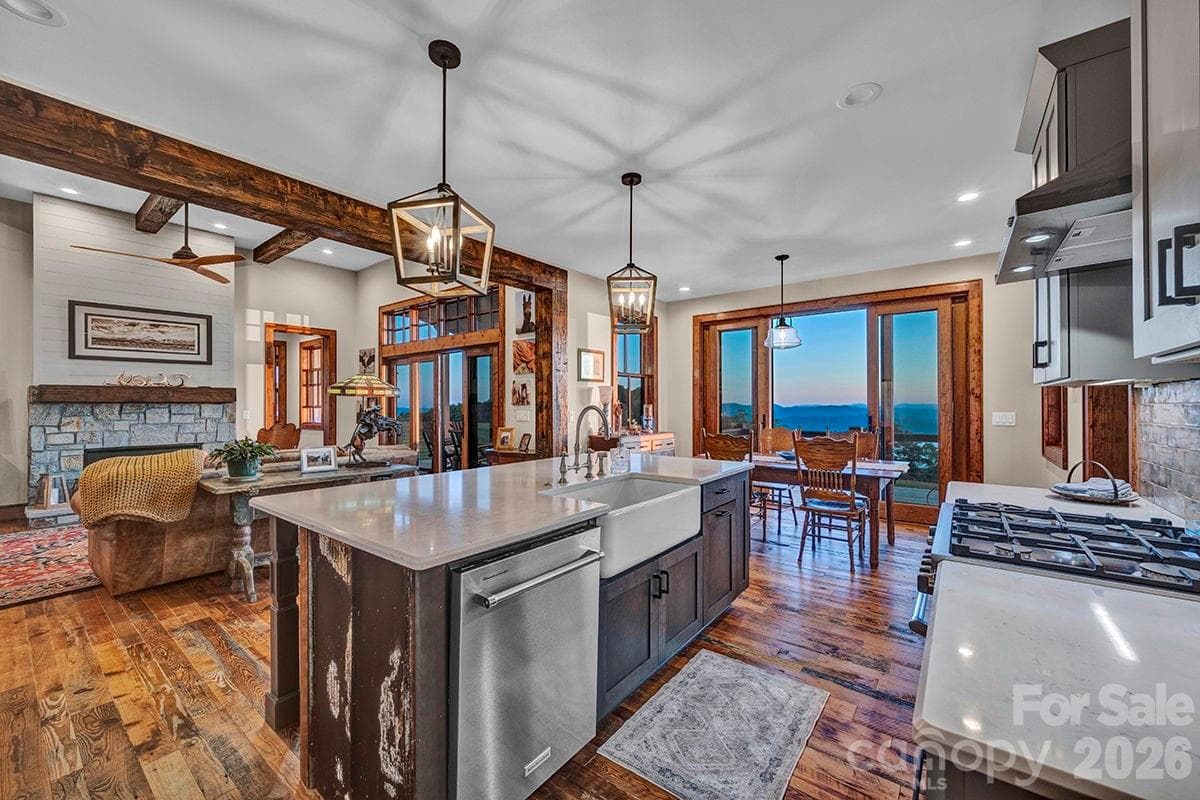 Kitchen open to dining area and great room - 217 Sunrise Vista Lane, Banner Elk