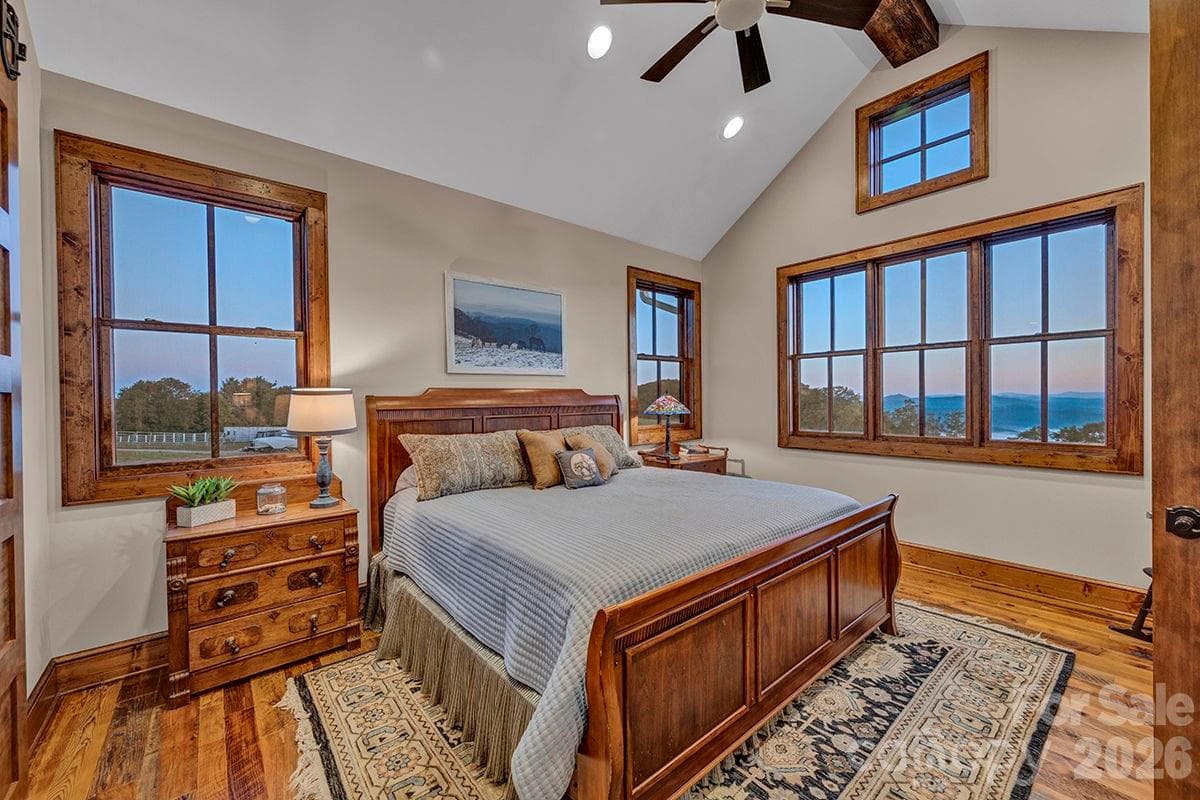 Main floor primary with walls of windows and cathedral ceiling - 217 Sunrise Vista Lane, Banner Elk
