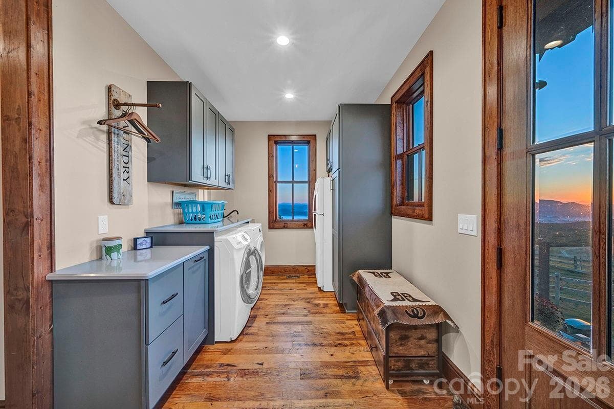 Mahogany and glass side entrance door into the laundry/mud room, leave the dirt behind - 217 Sunrise Vista Lane, Banner Elk