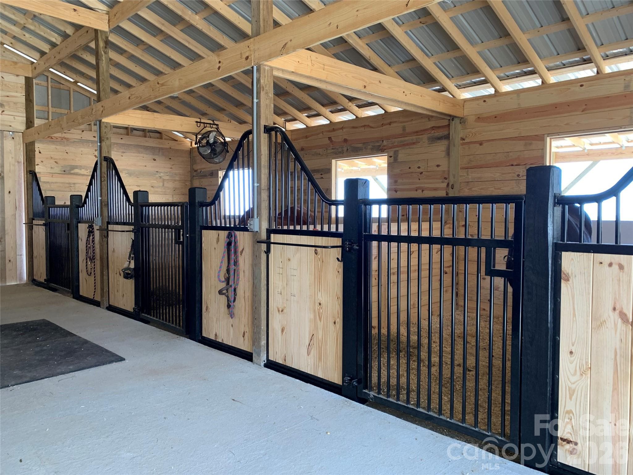 one stall is 12' x 24' foaling or warm blood stall, stall mats - 217 Sunrise Vista Lane, Banner Elk