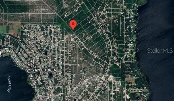 Check out this vacant lot for future build out or hold for investment. - 455 NICHELE BLVD, LAKE PLACID