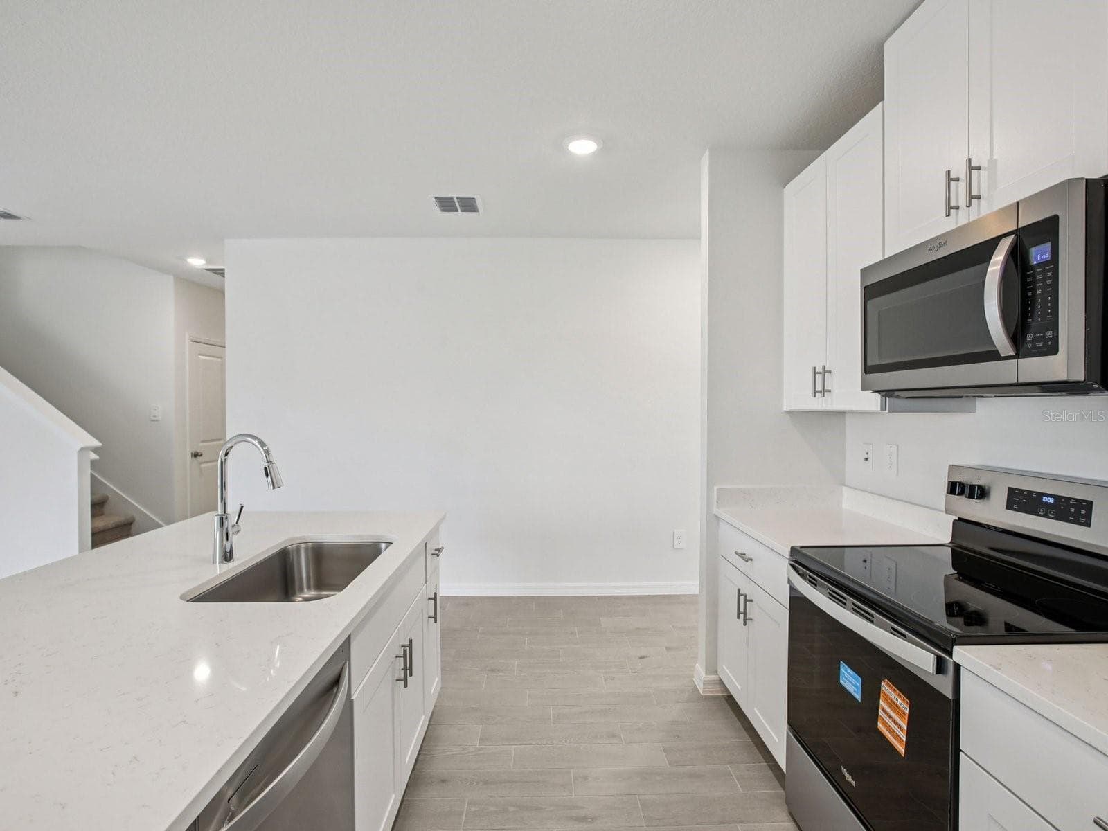 Interior photos are not of the actual home but are photos of the builder home with the same floorplan with similar interior finishes and features. - 7214 RAY CREEK DR, BROOKSVILLE