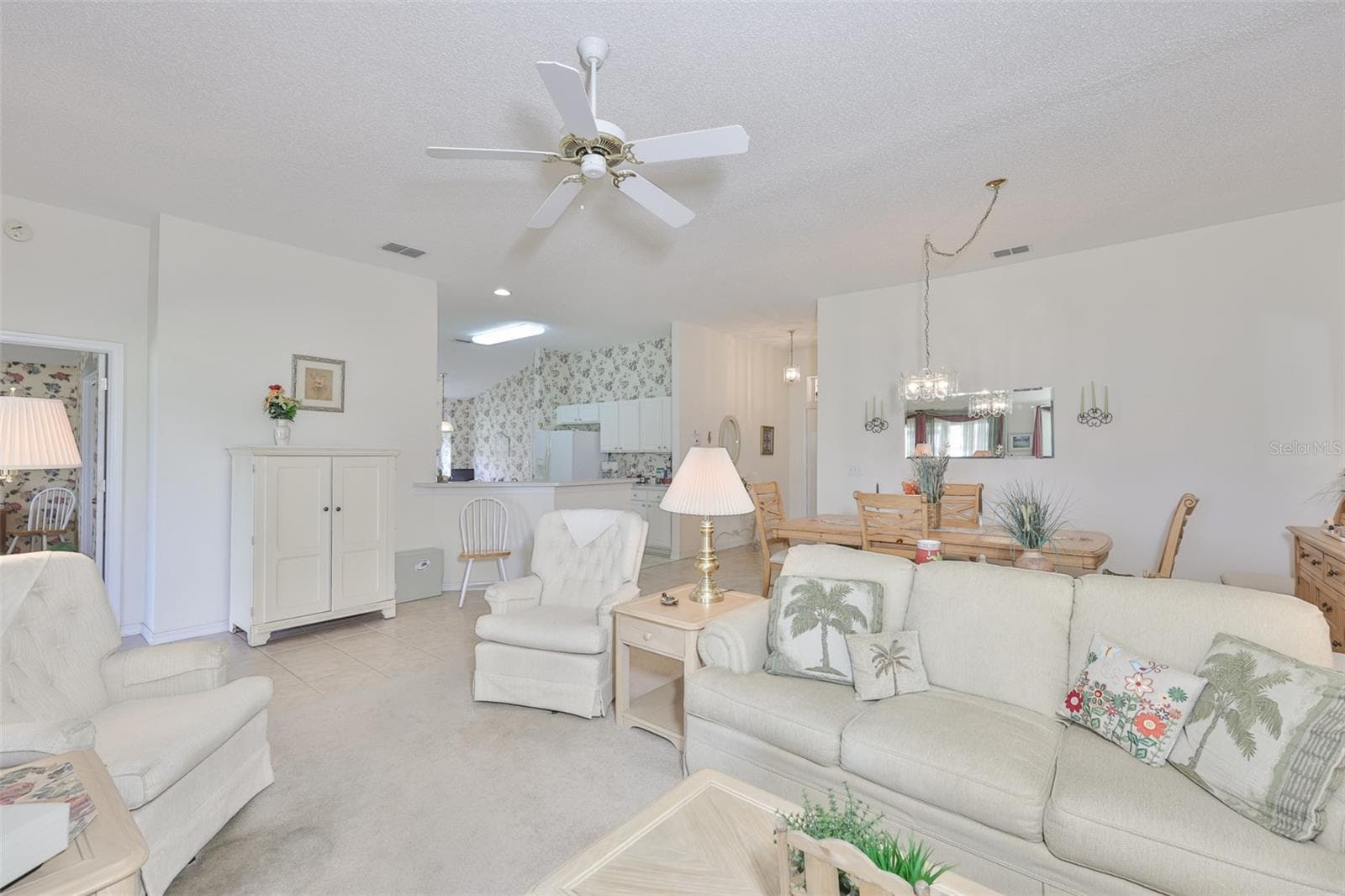 OPEN GREAT ROOM WITH HIGH CEILING WITH NEUTRAL PALETTE. - 2308 BROOKFIELD GREENS CIR, SUN CITY CENTER