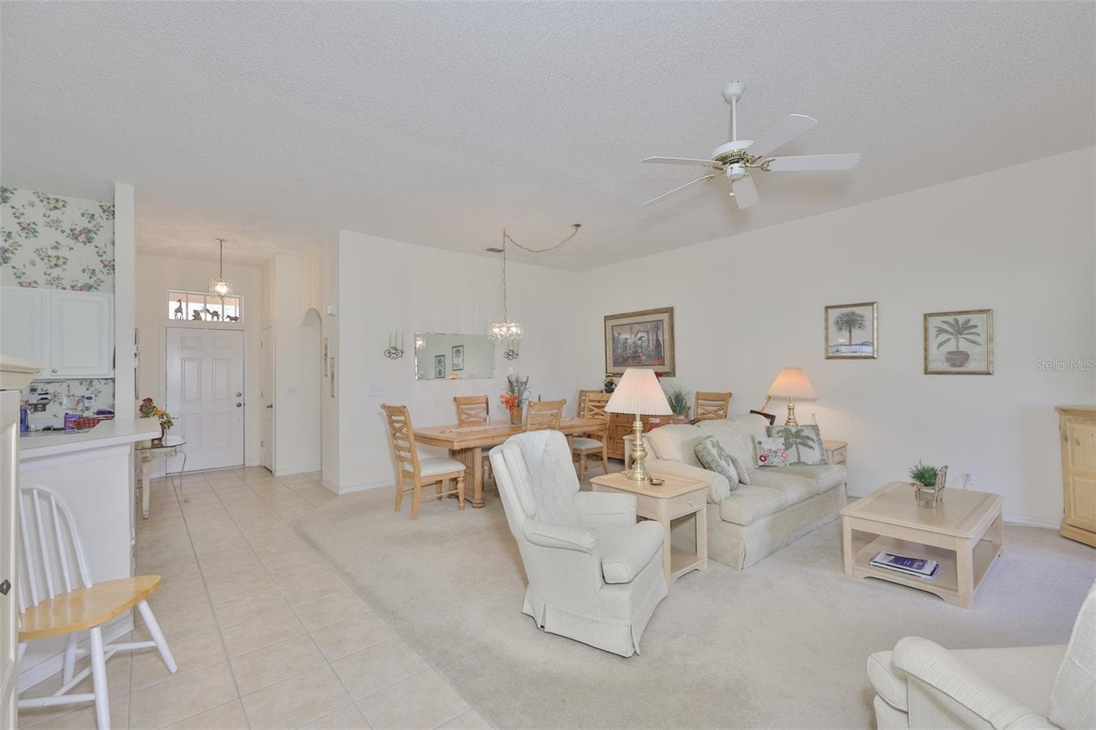 CERAMIC TILE RUNS THROUGH THE WET AREAS AND TRAFFIC PATTERN. - 2308 BROOKFIELD GREENS CIR, SUN CITY CENTER