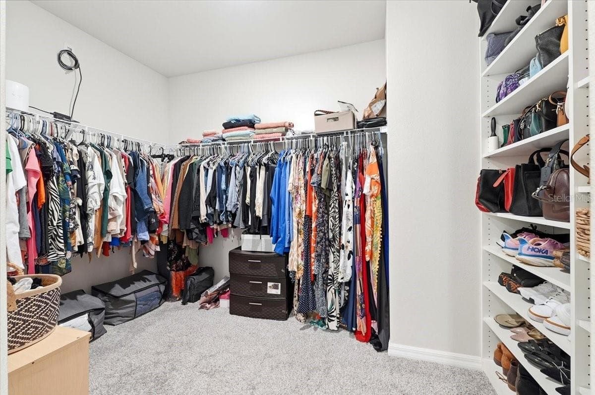 Primary Custom Built Closet - 1799 CARNOSTIE RD, WINTER HAVEN