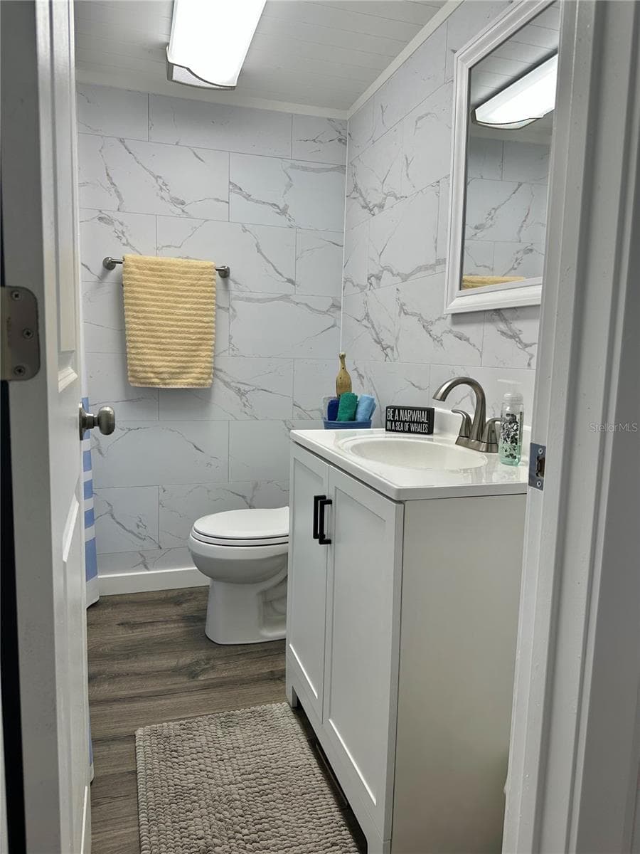 updated bathroom is 100% waterproof! waterproof flooring and walls! - 1501 25TH AVENUE DR W, BRADENTON