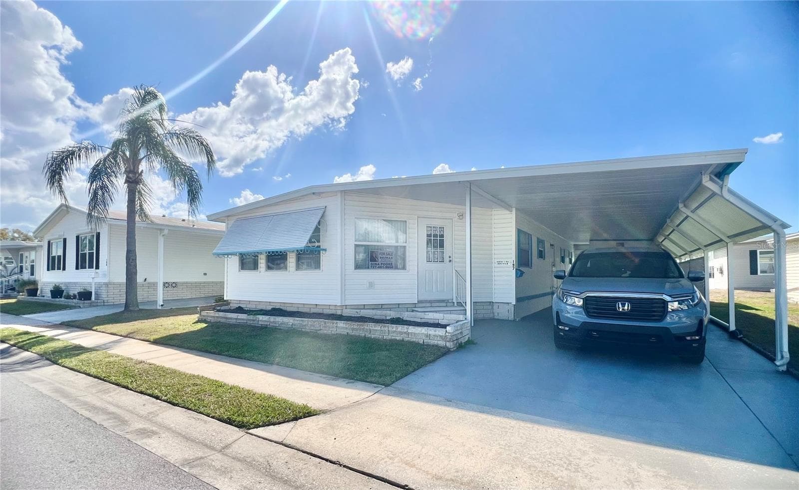 Front of home - 1100 BELCHER RD S #197, LARGO