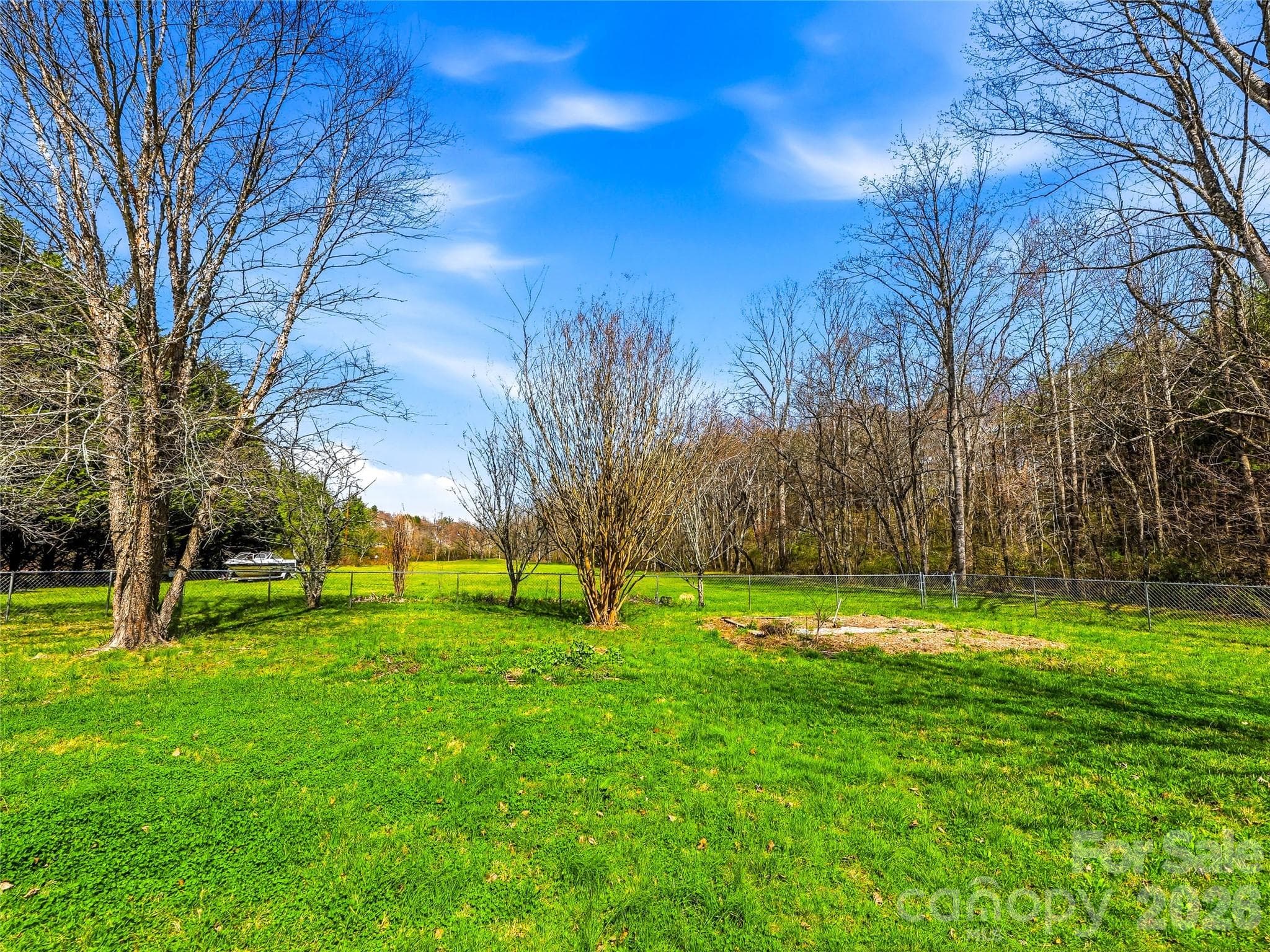 Part of the acerage is fenced - 61 Rolling Hills Road, Mills River