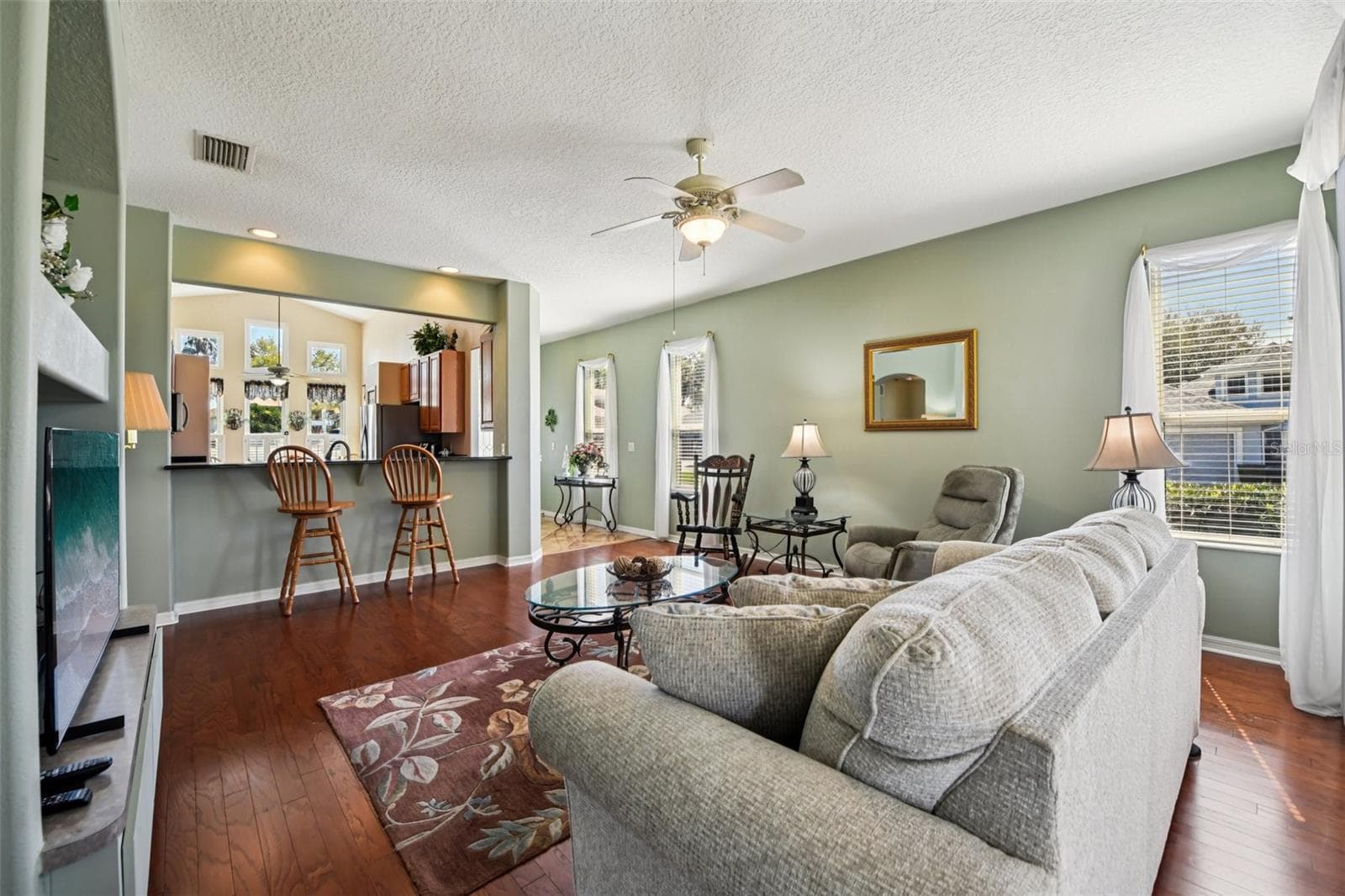 Bar pass through to kitchen. - 6105 DORY WAY, TAVARES
